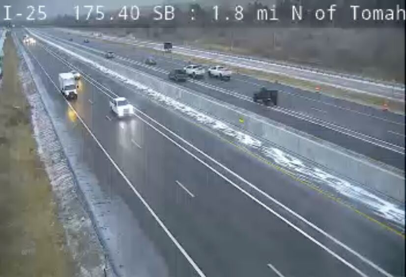This traffic camera image shows the express lanes open on I-25.