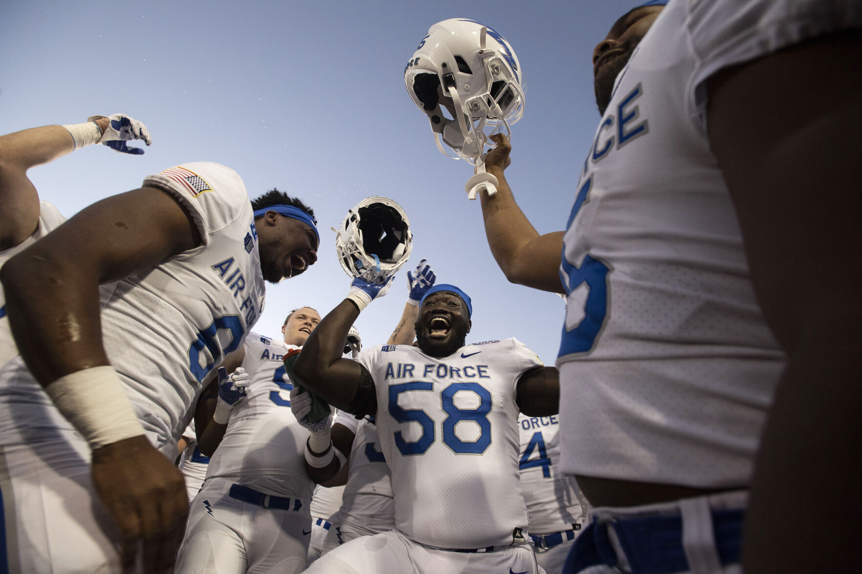 Air Force Falcons celebrate after defeating the Louisville Cardinals during the 2021 First Responder Bowl at Gerald J. Ford Stadium on the campus of Southern Methodist University in Dallas, Texas on Tuesday, Dec. 28, 2021. The Falcons defeated the Cardinals and won the bowl game by a score of 31-28. (Chancey Bush/ The Gazette) (Chancey Bush/ The Gazette)
