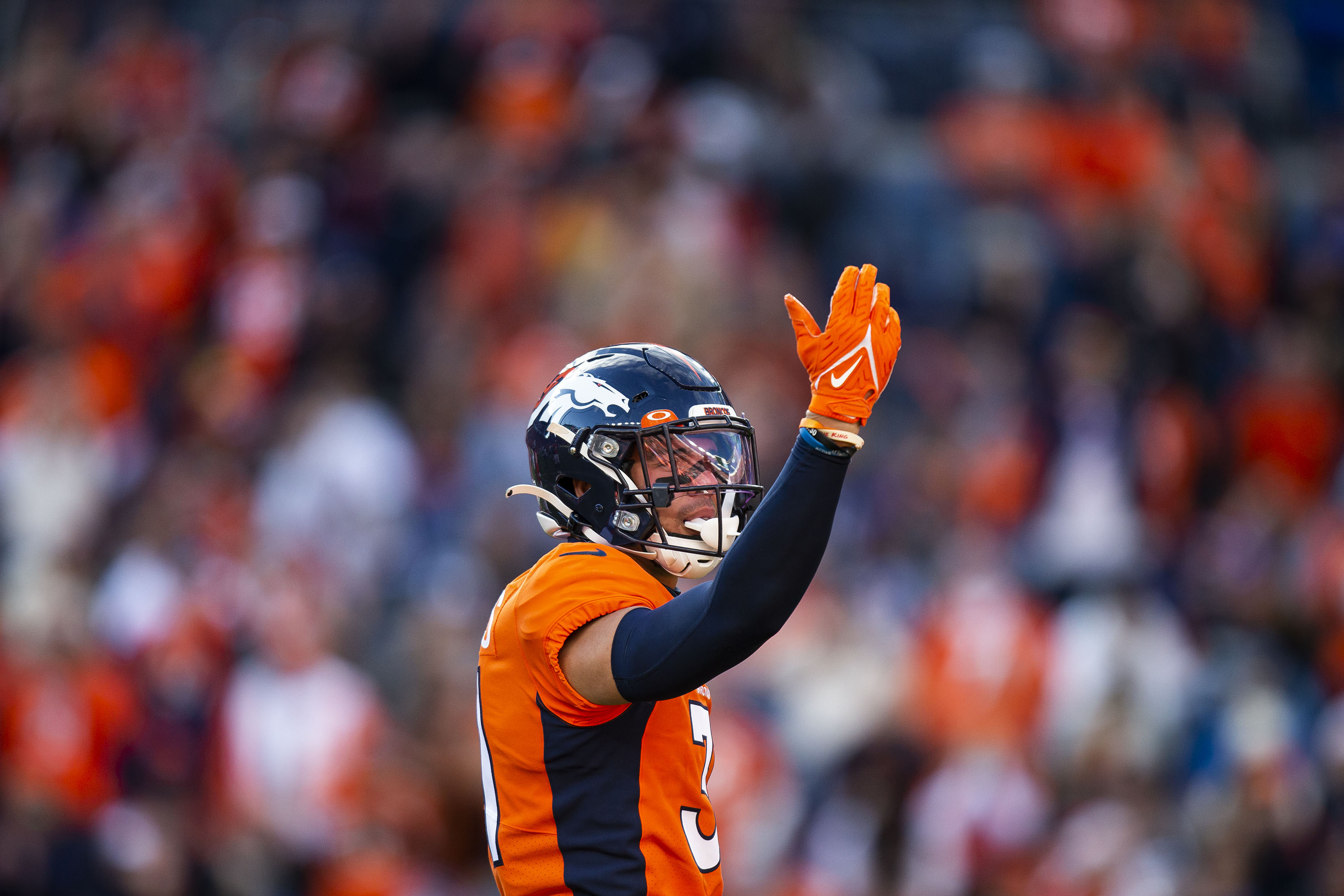 Denver Broncos safety Justin Simmons (31) celebrates after sacking Cincinnati Bengals quarterback Joe Burrow (9) during the first half on Sunday, Dec. 19, 2021, at Empower Field at Mile High in Denver, Colo. (Timothy Hurst/The Gazette) (TimHursttim.hurst@gazette.comhttps://secure.gravatar.com/avatar/aca82bd62b4ee425c598527cd6faa1b1?d=mm&r=g)