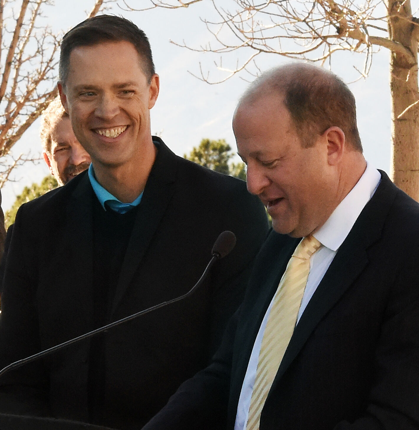 Gov. Jared Polis announced that he has appointed Nick Ragain (left), president of the Colorado Springs Switchbacks, to the Colorado Tourism Board during a press conference at UCCS on Monday, Dec. 20, 2021 (Photo by Jerilee Bennett, The Gazette) (Jerilee Bennett/The Gazette)