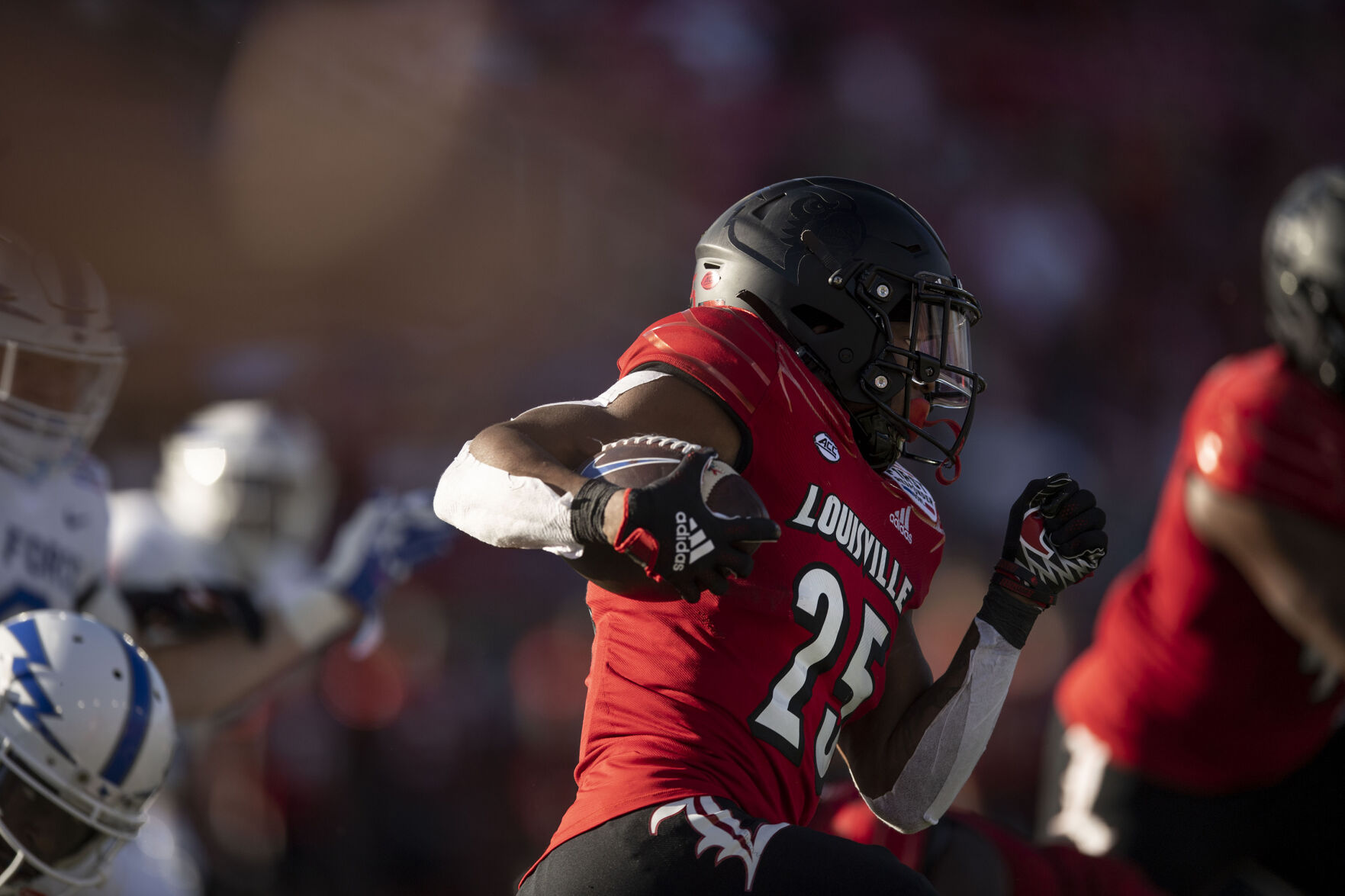 Louisville Cardinals freshman running back Jawhar Jordan (25) carries the ball during the 2021 First Responder Bowl at Gerald J. Ford Stadium on the campus of Southern Methodist University in Dallas, Texas on Tuesday, Dec. 28, 2021. The Falcons defeated the Cardinals and won the bowl game by a score of 31-28. (Chancey Bush/ The Gazette) (Chancey Bush/ The Gazette)