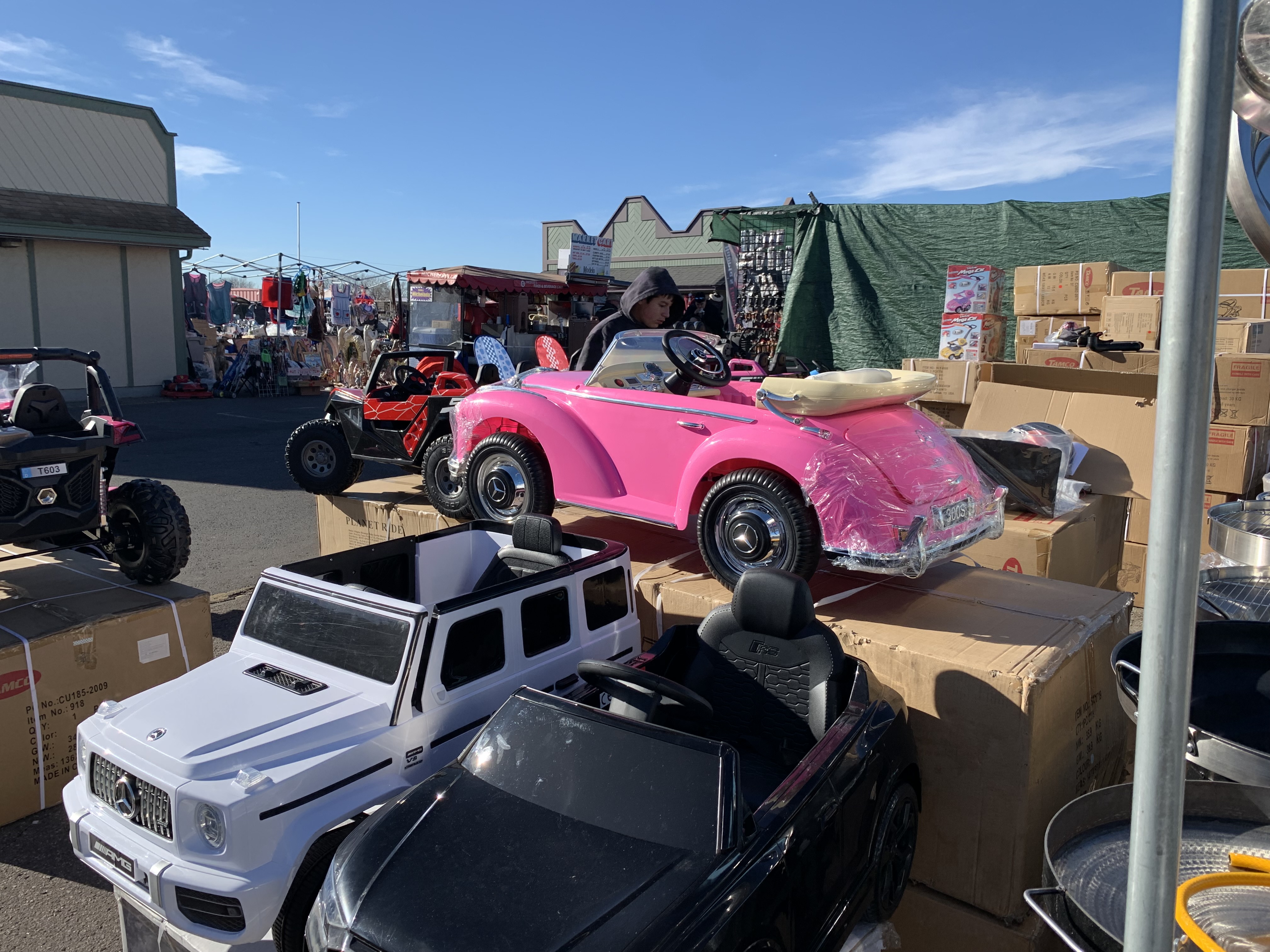 A vendor at Mile High Flea Market selling children's battery-powered cars Saturday. (DennisHuspeniCity Editordennis.huspeni@gazette.comhttps://denvergazette.com/content/tncms/avatars/c/5a/fbd/c5afbd32-5030-11eb-bdef-030d9de52a9e.779683cee495ffe64766291c251a8894.png)