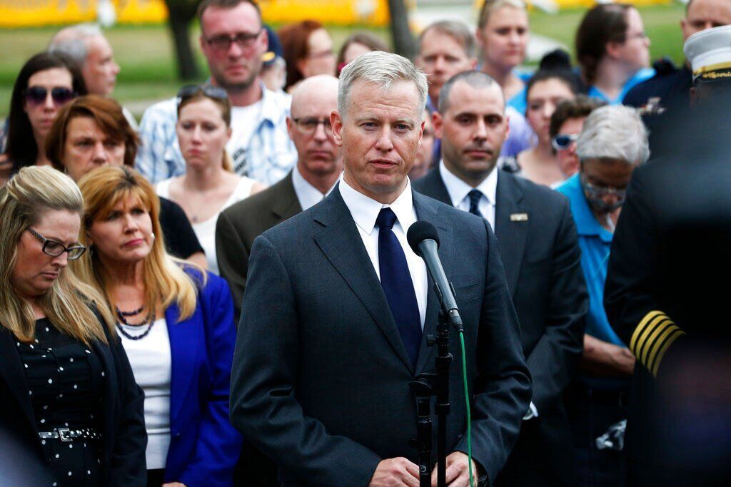In this Aug. 7, 2015, photograph, George Brauchler, district attorney for Colorado's 18th Judicial District, talks after the jury sentenced James Homes to life in prison without parole for the 2012 Aurora theater shooting that left 12 dead and 70 wounded. Brauchler is the co-author to a report on Colorado rising crime released Thursday, Dec. 9, 2012. (AP Photo/David Zalubowski, File)