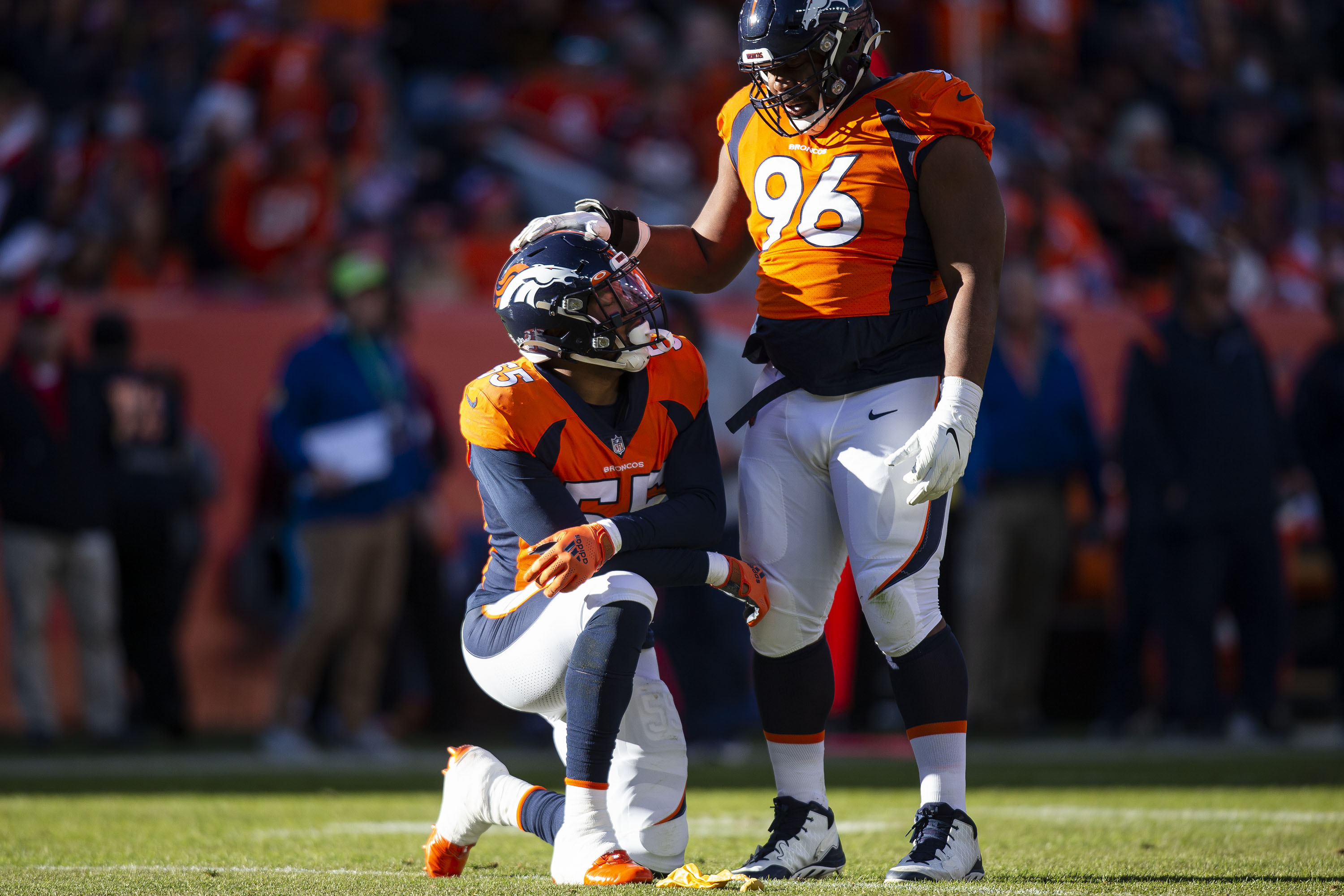Denver Broncos outside linebacker Bradley Chubb (55) and defensive end Shelby Harris (96) wait by a flag thrown for holding against the Cincinnati Bengals offense on Sunday, Dec. 19, 2021, at Empower Field at Mile High in Denver, Colo. (Timothy Hurst/The Gazette) (Timothy Hurst)