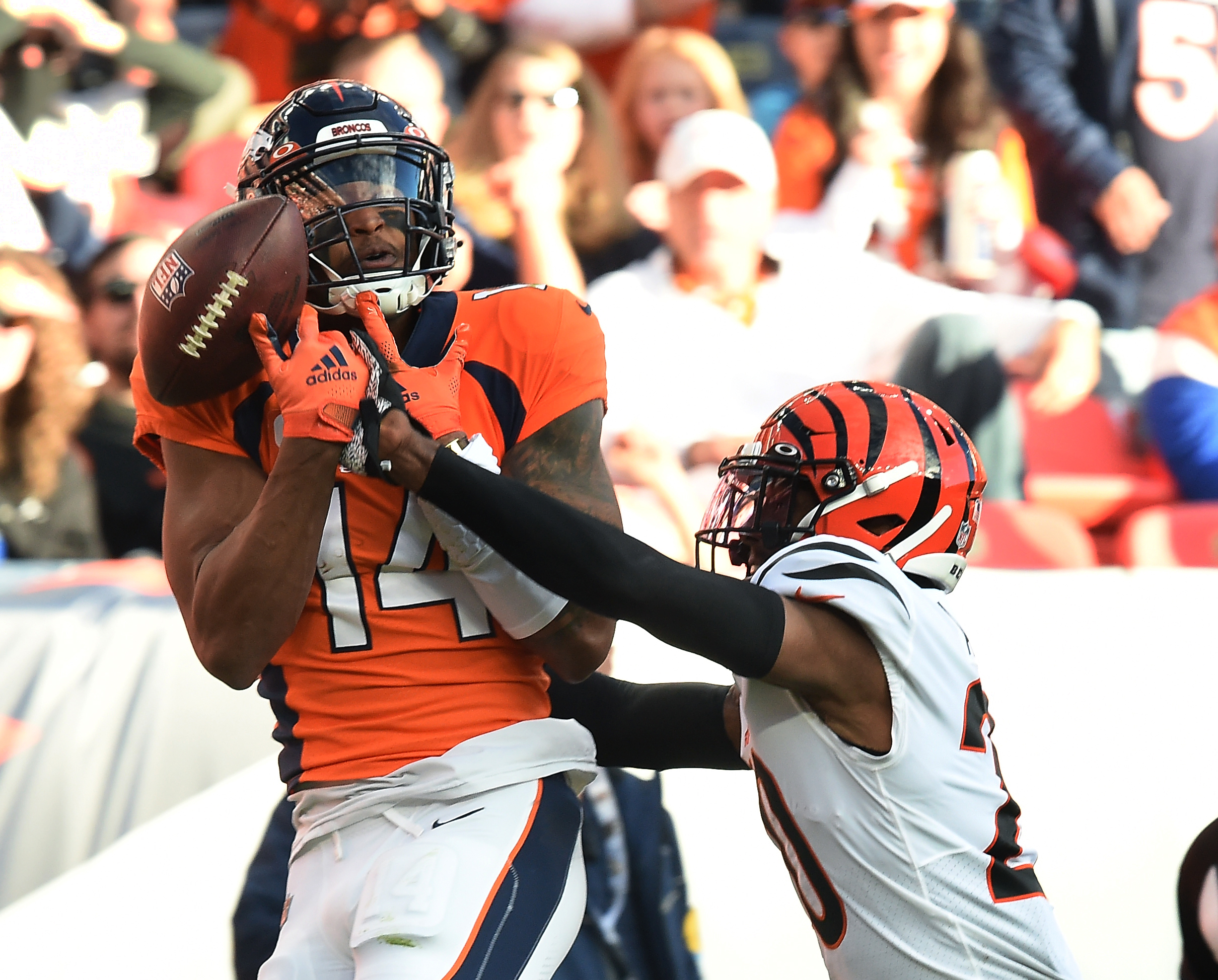 A missed opportunity for Broncos receiver Courtland Sutton. He dropped this pass near the end zone while being defended by Bengals cornerback Eli Apple. The Broncos played the Bengals at Mile High Stadium on Sunday, Dec. 19, 2021. The Broncos lost the game 15-10. (Photo by Jerilee Bennett, The Gazette) (Jerilee Bennett)