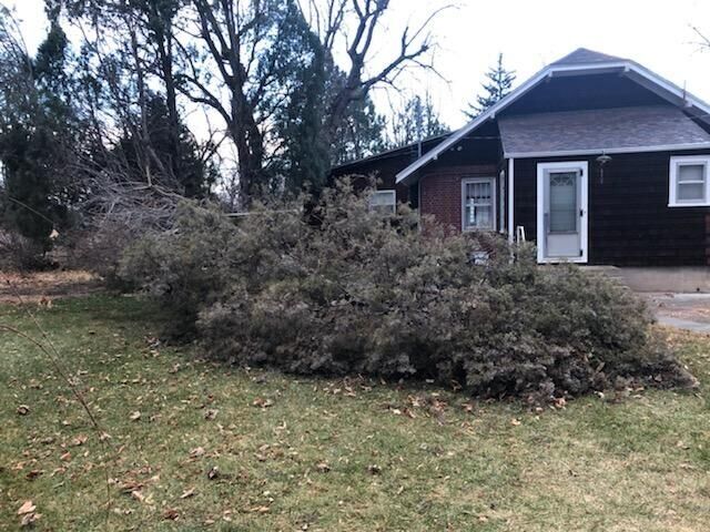 High winds hit Pueblo on Wednesday, Dec. 15, 2021, knocking down this tree. (Mary Shinn, The Gazette)