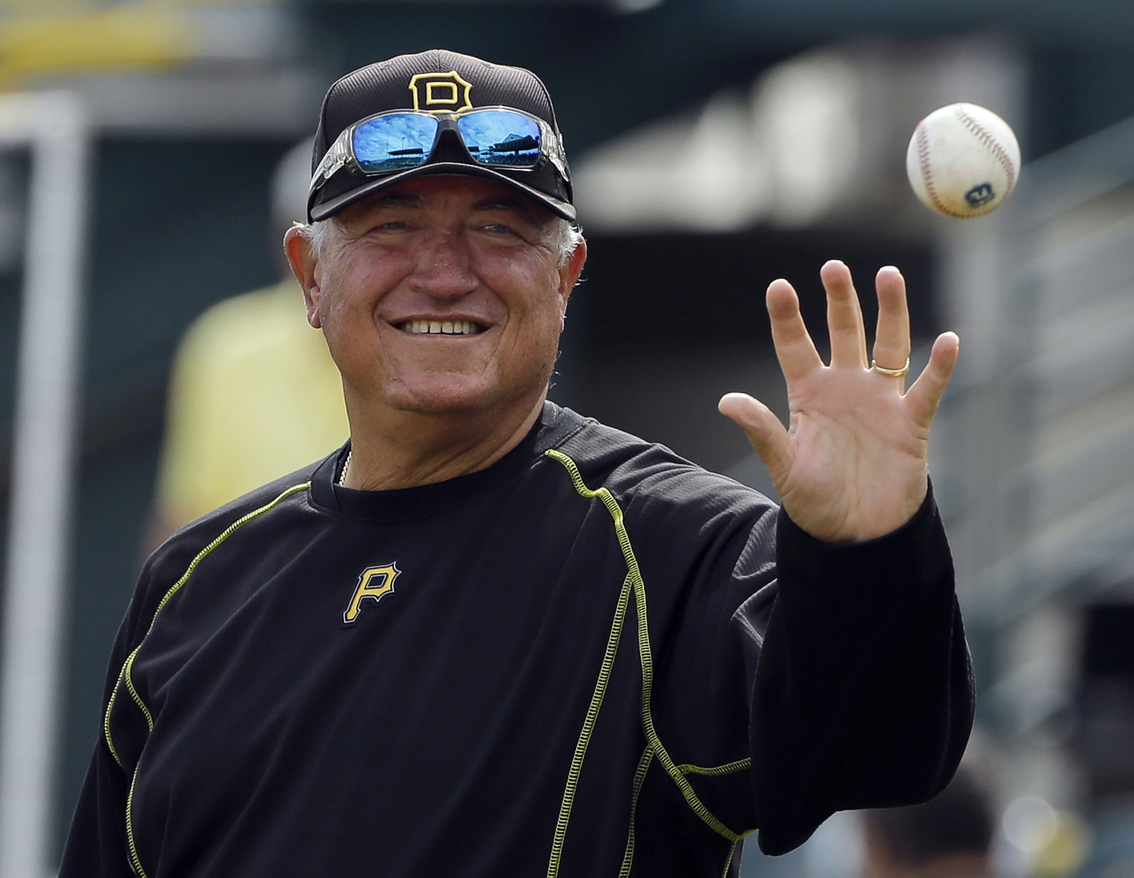 FILE - In this March 11, 2016, file photo, Pittsburgh Pirates manager Clint Hurdle catches a baseball while hitting grounders to his infielders before a spring training baseball game against the Tampa Bay Rays, in Bradenton, Fla. The Pirates are hoping a better start leads to a better finish in 2016. (AP Photo/Chris O'Meara, File) (Chris O'Meara)