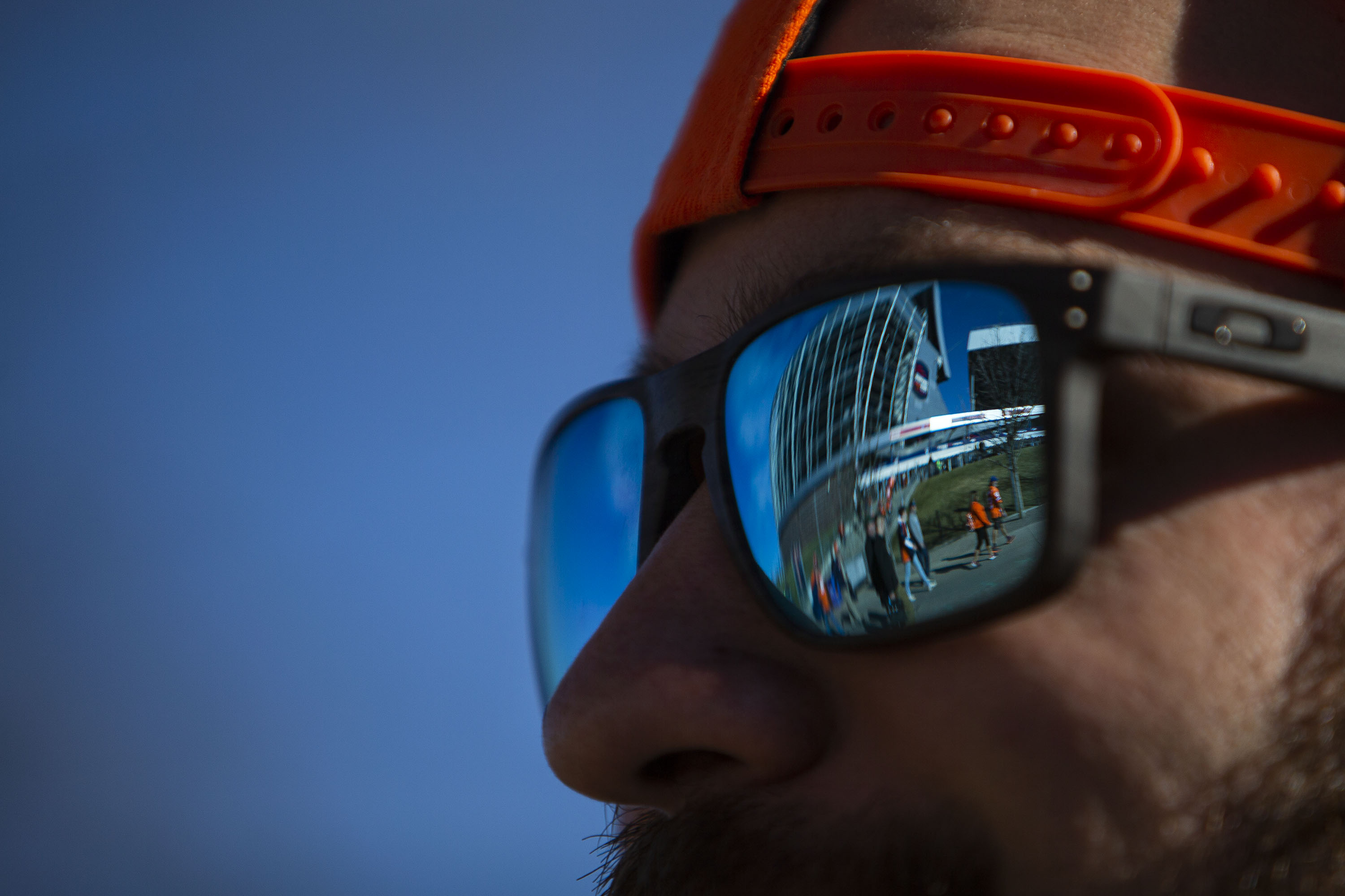 Fans are reflected in Denver resident Antonio Pacifico’s glasses before the Denver Broncos take on the Cincinnati Bengals on Sunday, Dec. 19, 2021, at Empower Field at Mile High in Denver, Colo. (Timothy Hurst/The Gazette) (Timothy Hurst)