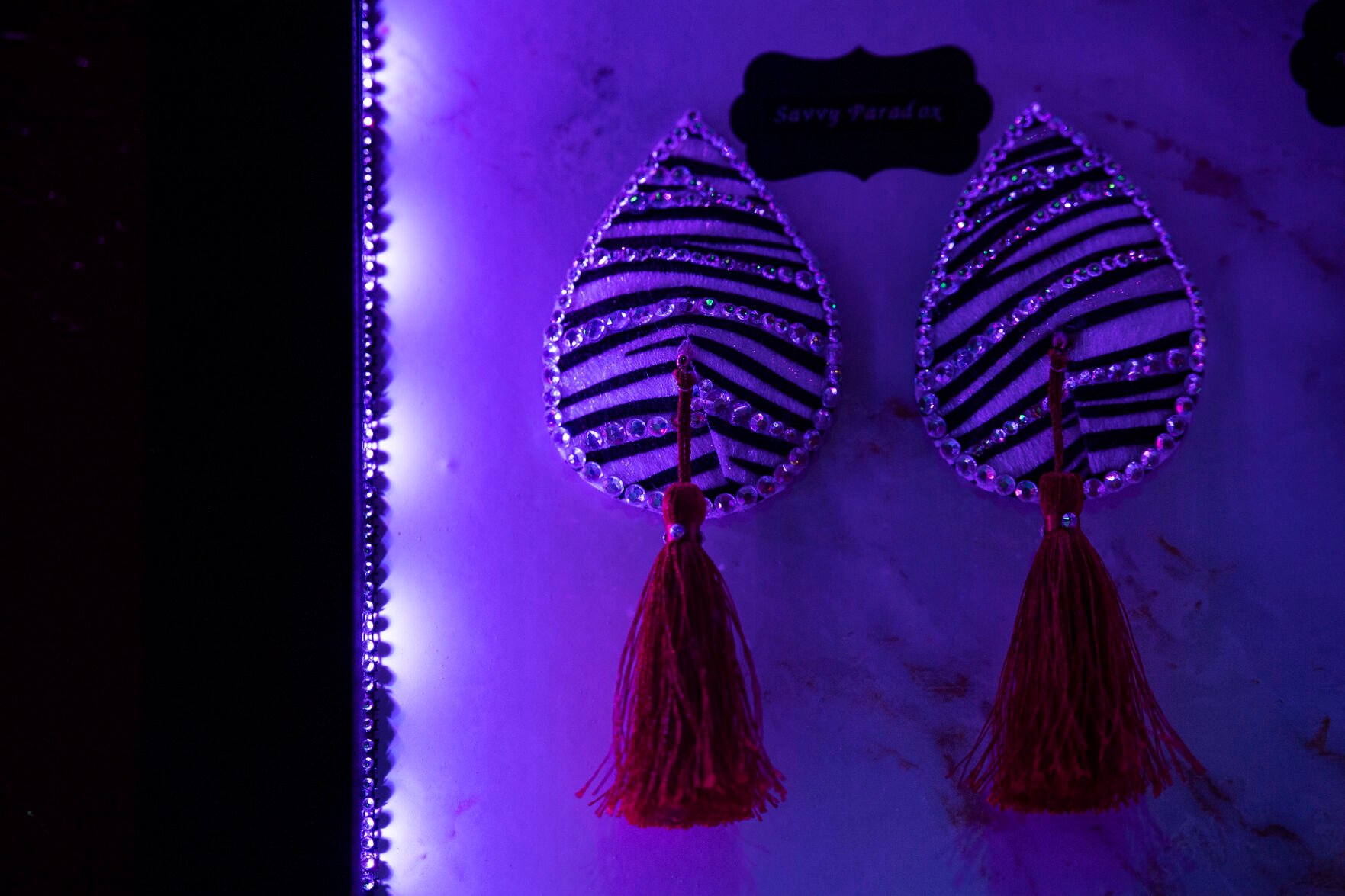 A display case of pasties worn by performers are showcased in the restaurant and bar of the new burlesque venue, La Burla Bee, a cabaret-style restaurant and bar located in the space previously known as The Underground in downtown Colorado Springs.  (Chancey Bush/ The Gazette) (Chancey Bush/ The Gazette)