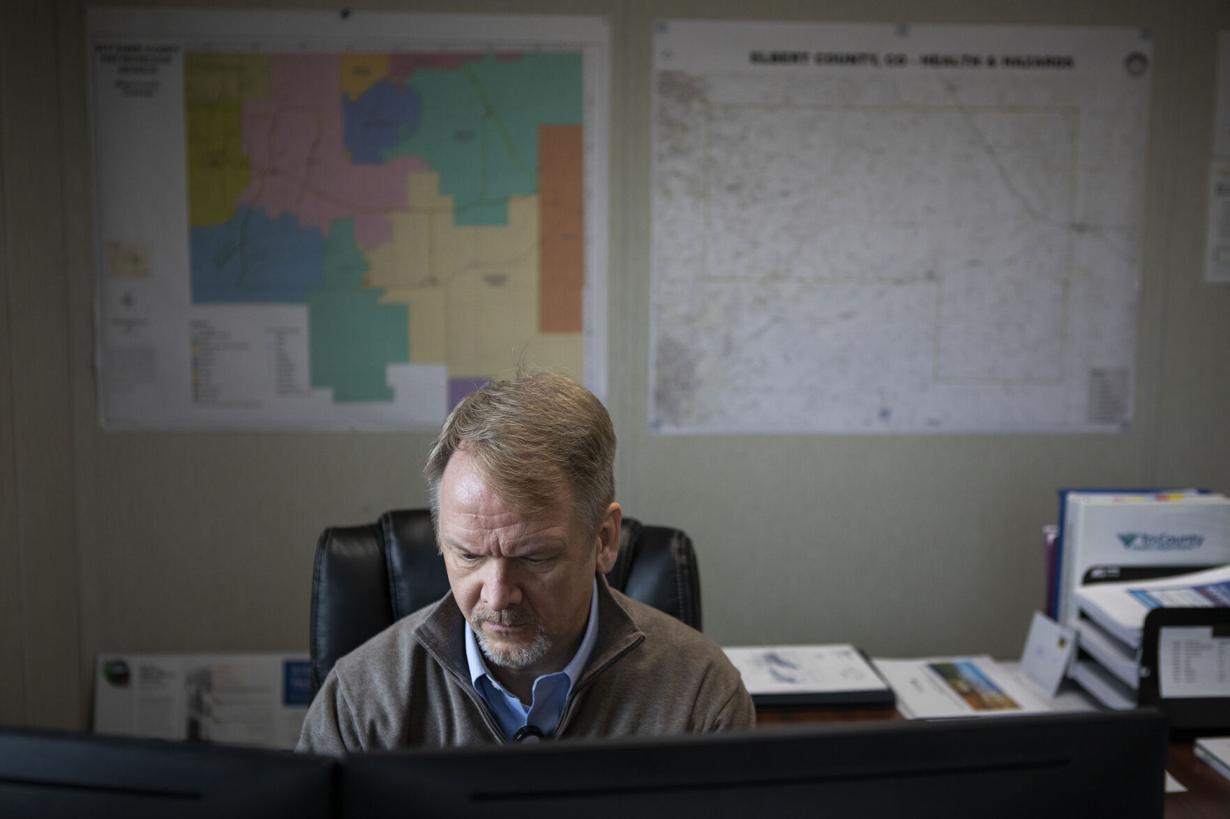 Elbert County public health director Dwayne Smith works from his office Wednesday in Kiowa. (Timothy Hurst/The Gazette)