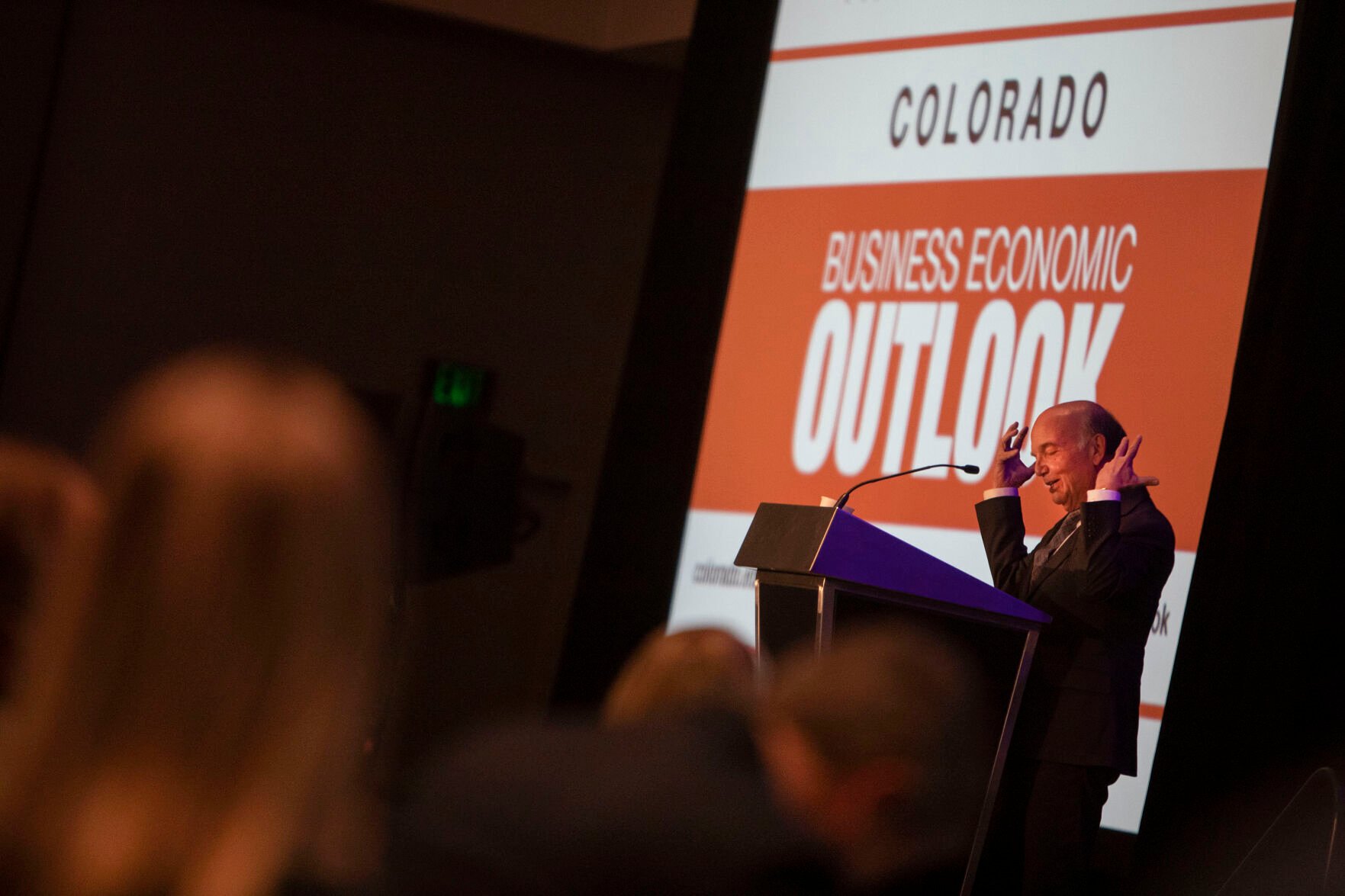 University of Colorado Boulder Leeds School of Business business research division faculty director Richard L. Wobbekind gives a presentation with state demographer Elizabeth Garner on the economic outlook for the state in 2022 on Monday during the 57th annual Colorado Business Economic Outlook 2022 at the Grand Hyatt Hotel in Denver. (Timothy Hurst, The Gazette)