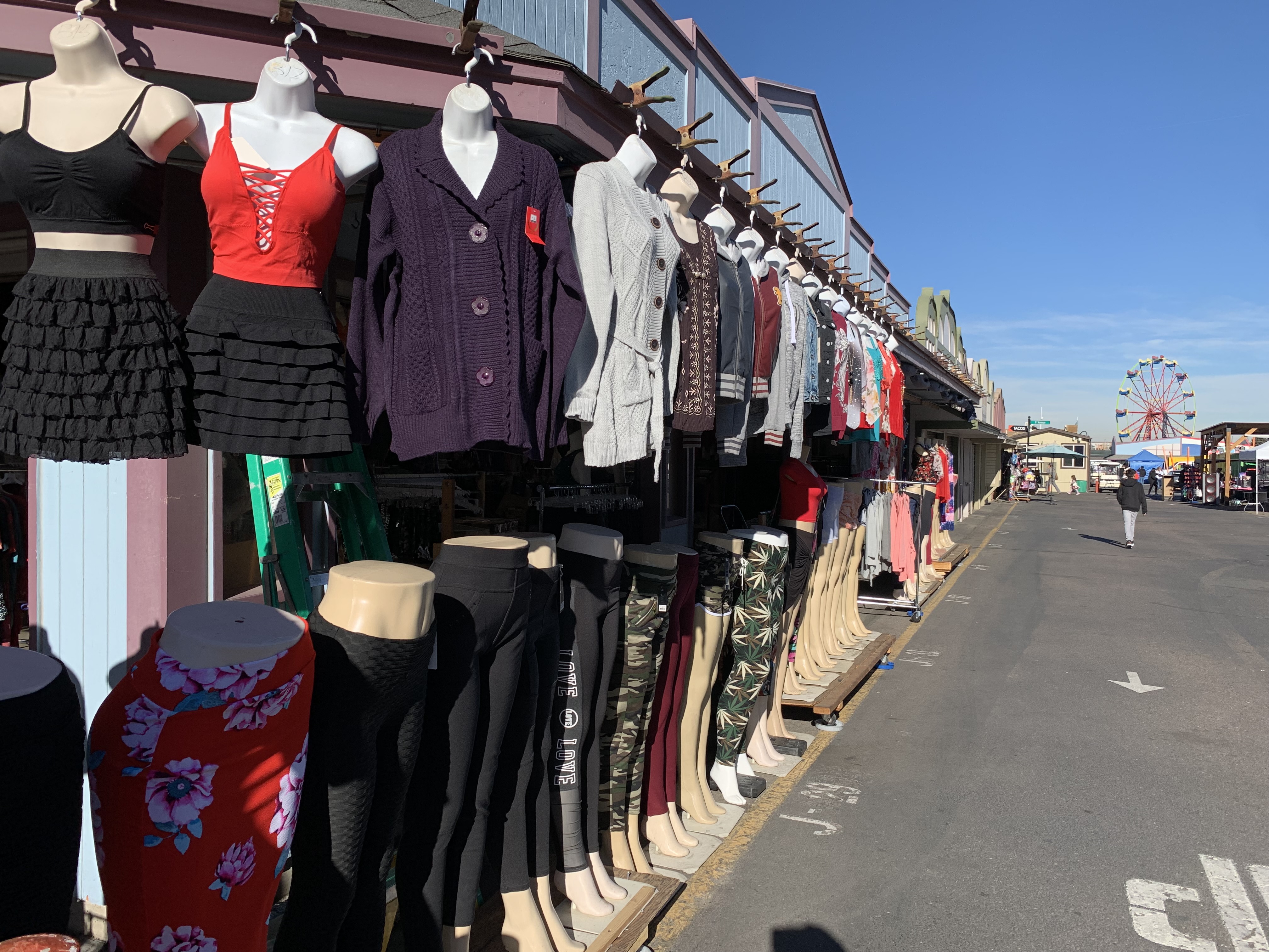 A Mile High Flea Market vendor dispays women's clothing Saturday. The market's new ferris wheel is in the background. (DennisHuspeniCity Editordennis.huspeni@gazette.comhttps://denvergazette.com/content/tncms/avatars/c/5a/fbd/c5afbd32-5030-11eb-bdef-030d9de52a9e.779683cee495ffe64766291c251a8894.png)