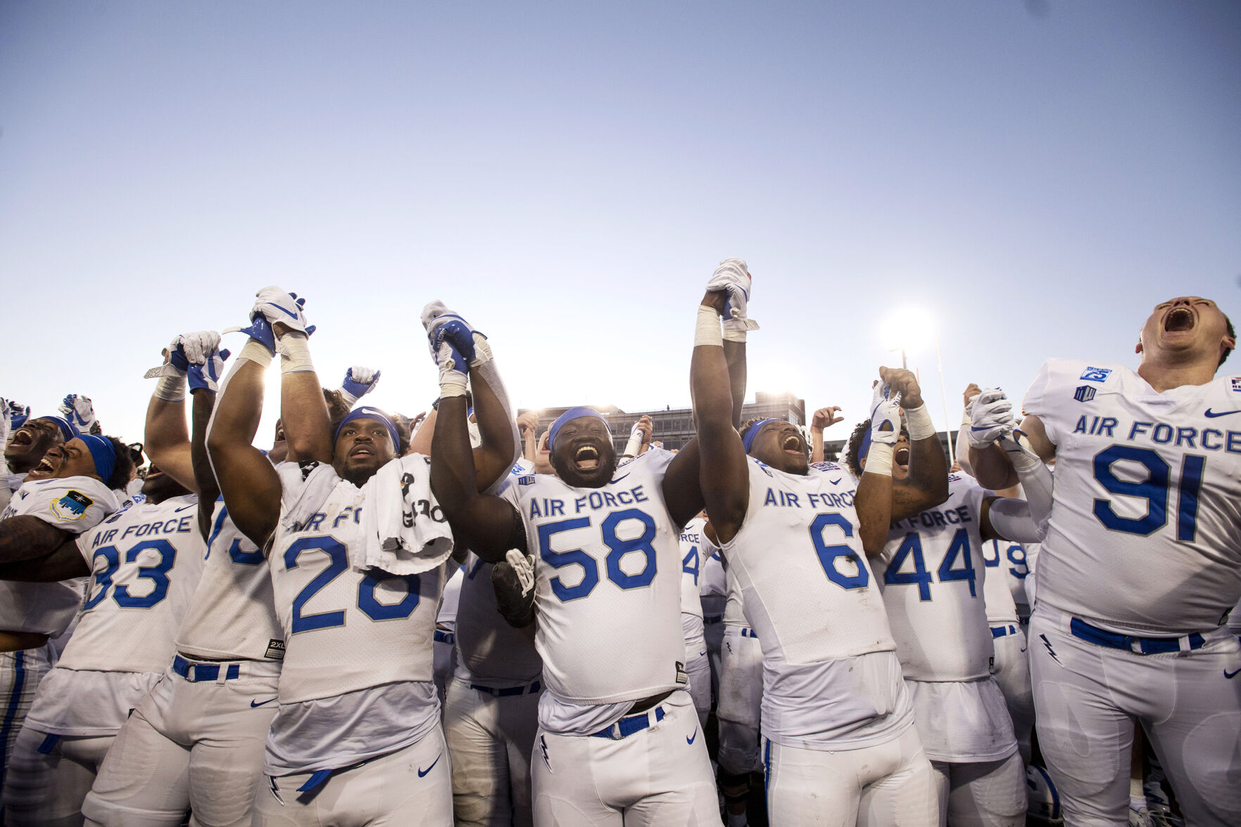 Air Force Falcons celebrate after defeating the Louisville Cardinals during the 2021 First Responder Bowl at Gerald J. Ford Stadium on the campus of Southern Methodist University in Dallas, Texas on Tuesday, Dec. 28, 2021. The Falcons defeated the Cardinals and won the bowl game by a score of 31-28. (Chancey Bush/ The Gazette) (Chancey Bush/ The Gazette)