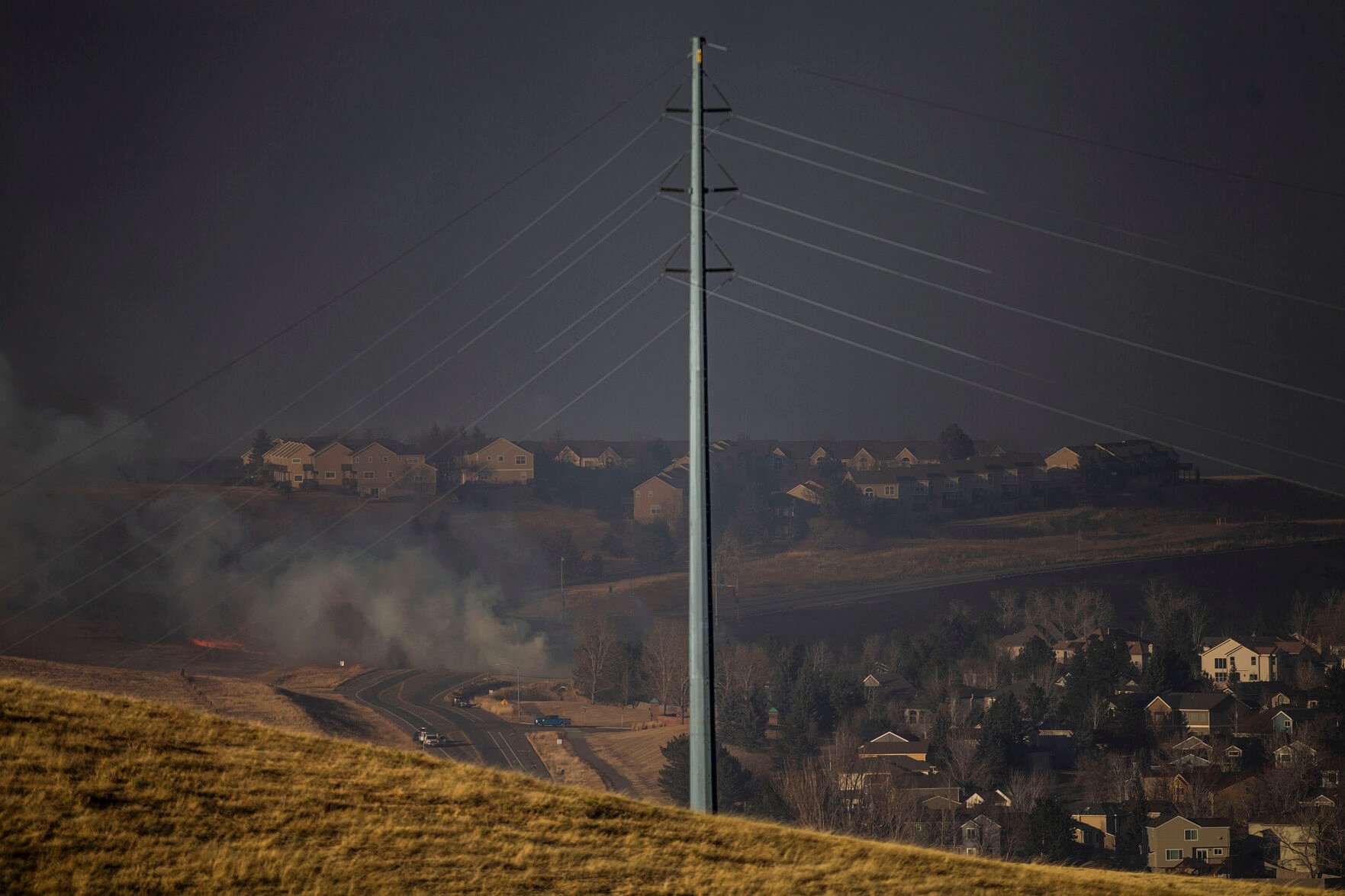 A large grassfire moves into a neighborhood off McCaslin Boulevard on Thursday, Dec. 30, 2021, in Superior, Colo. (Timothy Hurst/The Gazette) (Timothy Hurst)