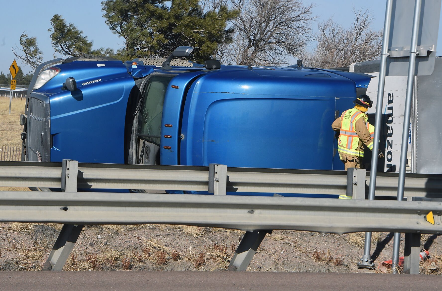 A semi-truck just north of N. Academy Blvd. in the southbound planes was part of the truck carnage on I-25 Wednesday, Dec. 15, 2021. Over a dozen semi trucks were blown over by high winds in the Pikes Peak region on I-25. (Photo by Jerilee Bennett, The Gazette) (Jerilee Bennett)