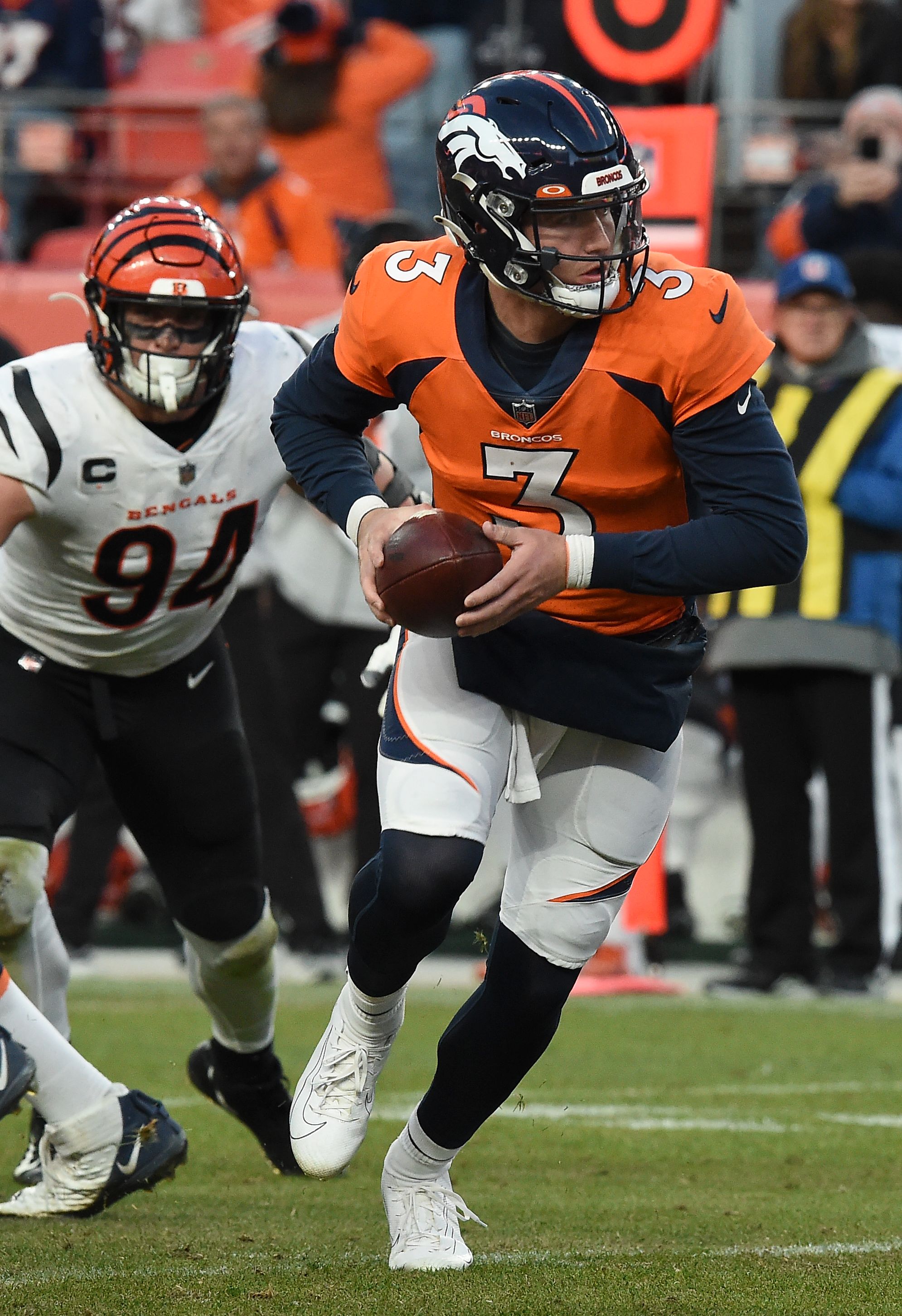 Broncos quarterback Drew Lock runs with the ball. The Broncos played the Bengals at Mile High Stadium on Sunday, Dec. 19, 2021. The Broncos lost the game 15-10. (Photo by Jerilee Bennett, The Gazette) (Jerilee Bennett)