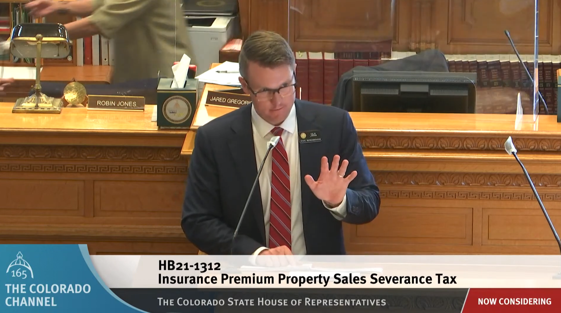 Rep. Colin Larson read a legal opinion in HB 1312 for three hours, often very slowly. (image from Colorado Channel)