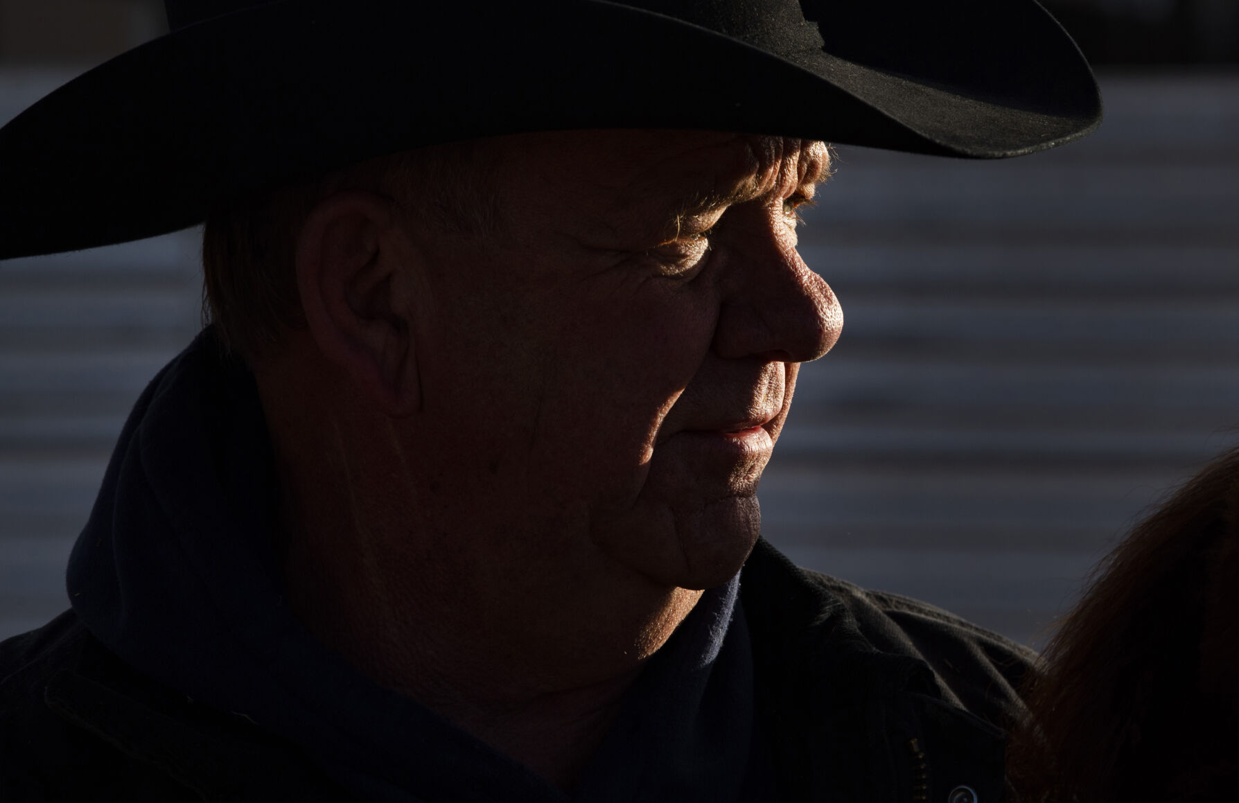 The morning sun spotlights ranch partner Gary Lake at the Silverado Ranch east of Colorado Springs, Wednesday, Jan. 5, 2022. (Christian Murdock, The Gazette)