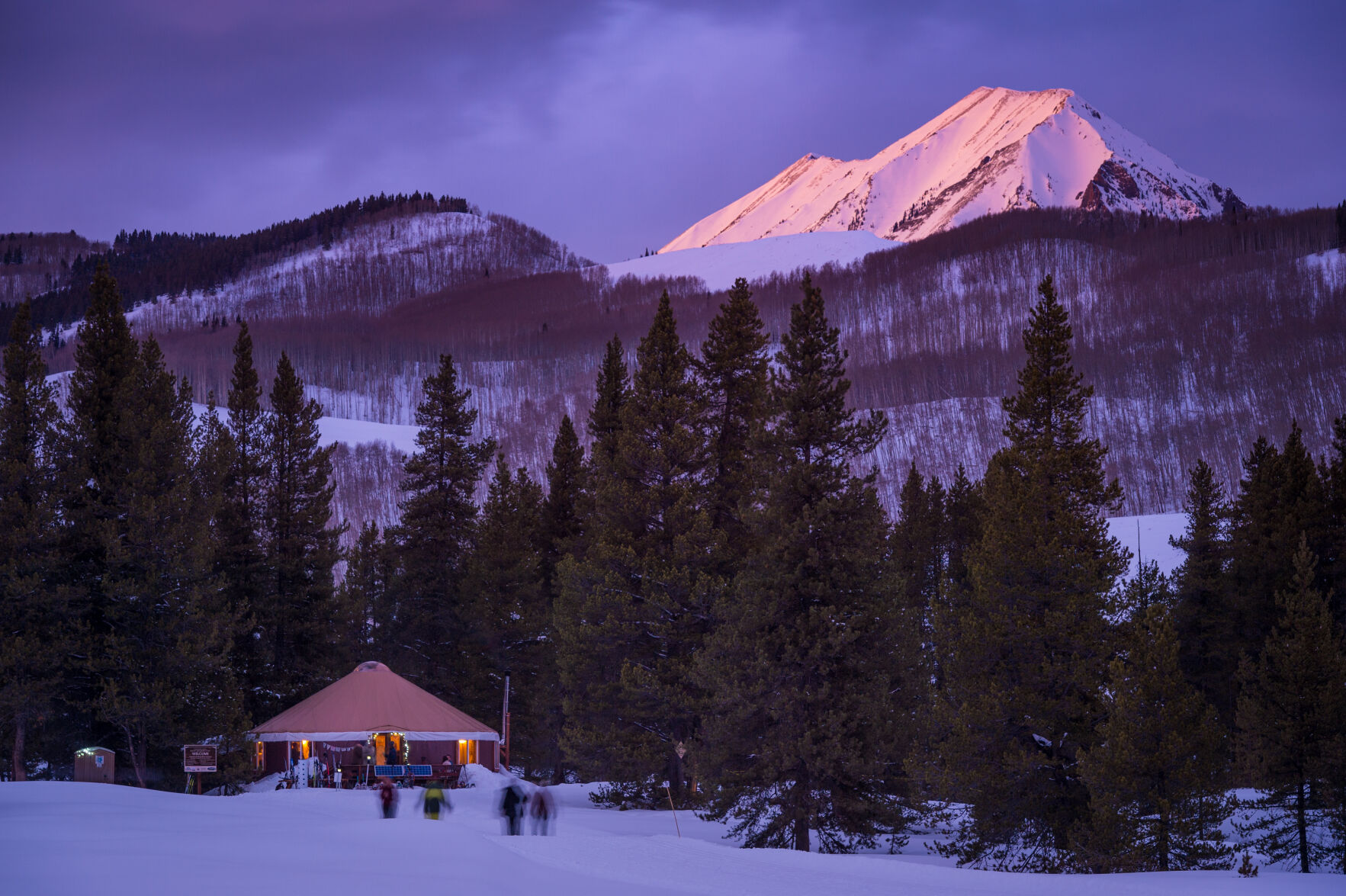 A warming hut glows during a backcountry tour as part of Crested Butte Nordic. For beginners, Nordic centers are a good place to learn the ways of cross-country skiing. (Courtesy Crested Butte Nordic)