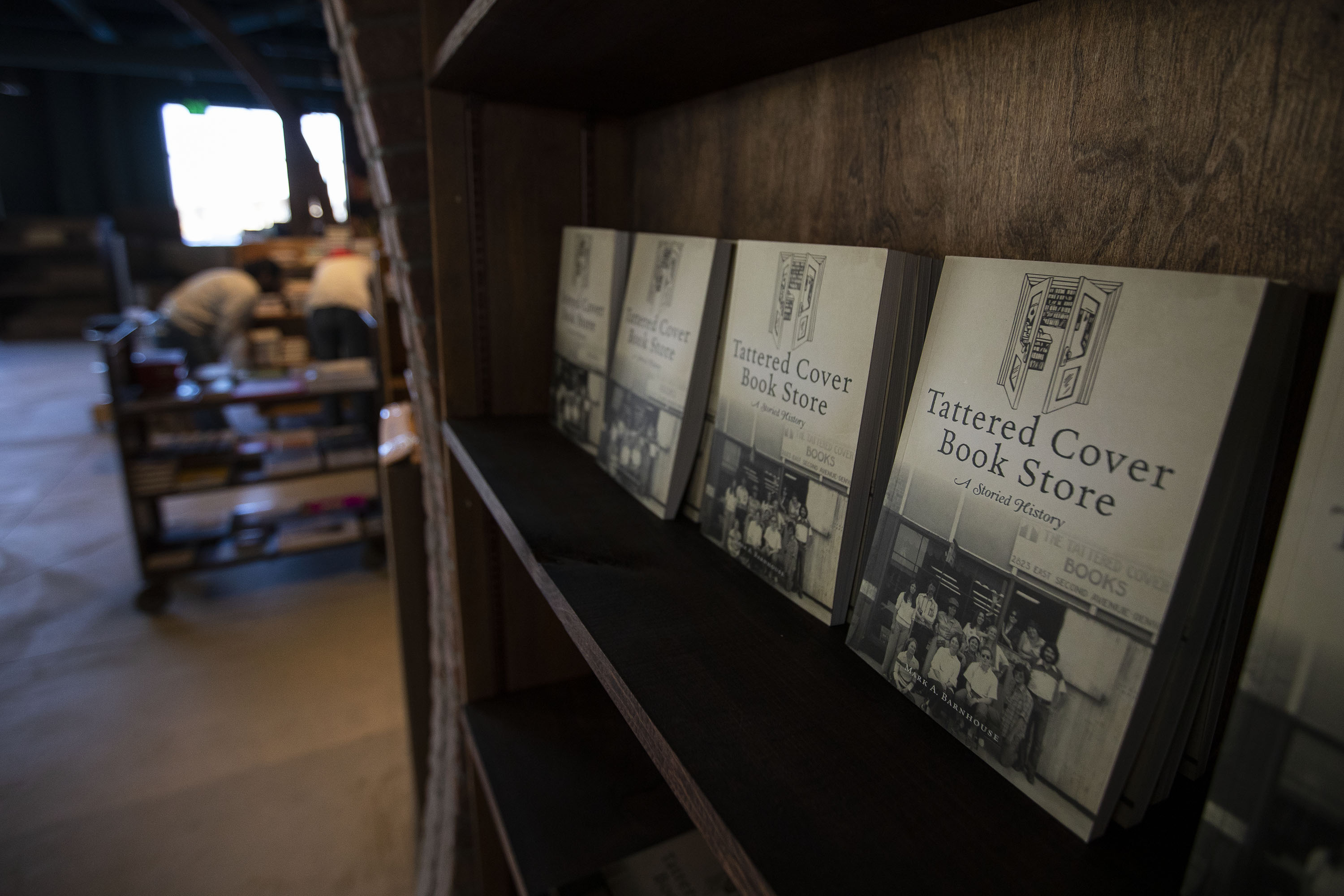 Copies of “Tattered Cover Book Store: A Storied History” by Mark A. Barnhouse, sit on the shelves of the book stores newest location, currently being stocked and prepped in anticipation of its opening, as seen on Tuesday, Jan. 4, 2022, in Westminster. (TimHursttim.hurst@gazette.comhttps://secure.gravatar.com/avatar/aca82bd62b4ee425c598527cd6faa1b1?d=mm&r=g)