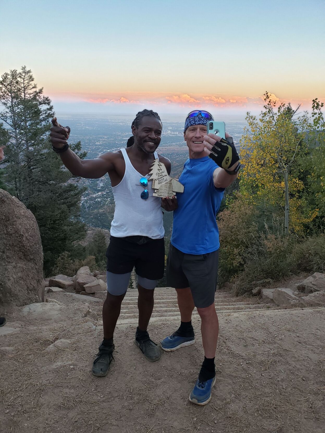 Christel Aime, left, takes a selfie atop the Manitou Incline with Greg Cummings. Aime joined Cummings in logging 1,000 ascents in a year, one of three to do so. Photo courtesy Christel Aime (Courtesy Christel Aime)