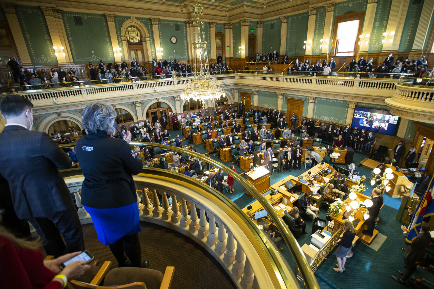 Gov. Jared Polis receives a standing ovation while delivering his State of the State address on Thursday, Jan. 13, 2022, in Denver, Colo. (Timothy Hurst/The Gazette) (Timothy Hurst)