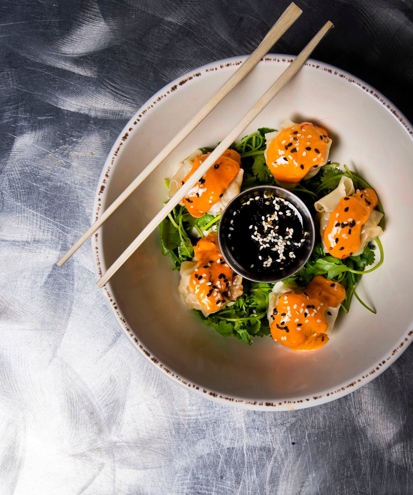 Lemongrass and Yuzu Pork Shumai with Gochujang Cream and White Soy and Yuzu Dipping Sauce at Rooster’s House of Ramen in Colorado Springs. Pictured Tuesday, Dec. 28, 2021. (Christian Murdock, The Gazette)