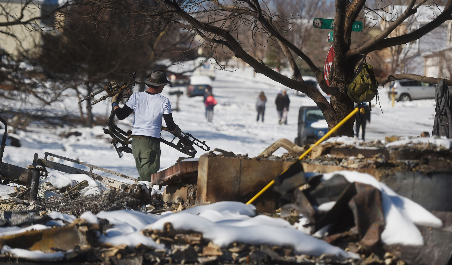 Rob Harris lost everything when his home burned during the Marshall Fire on Thursday night. He was clearing the rubble and was hoping to find the arrowheads that his father and he had collected. Harris said he and his wife are going to rebuild. (Photo by Jerilee Bennett, The Gazette) (Jerilee Bennett)