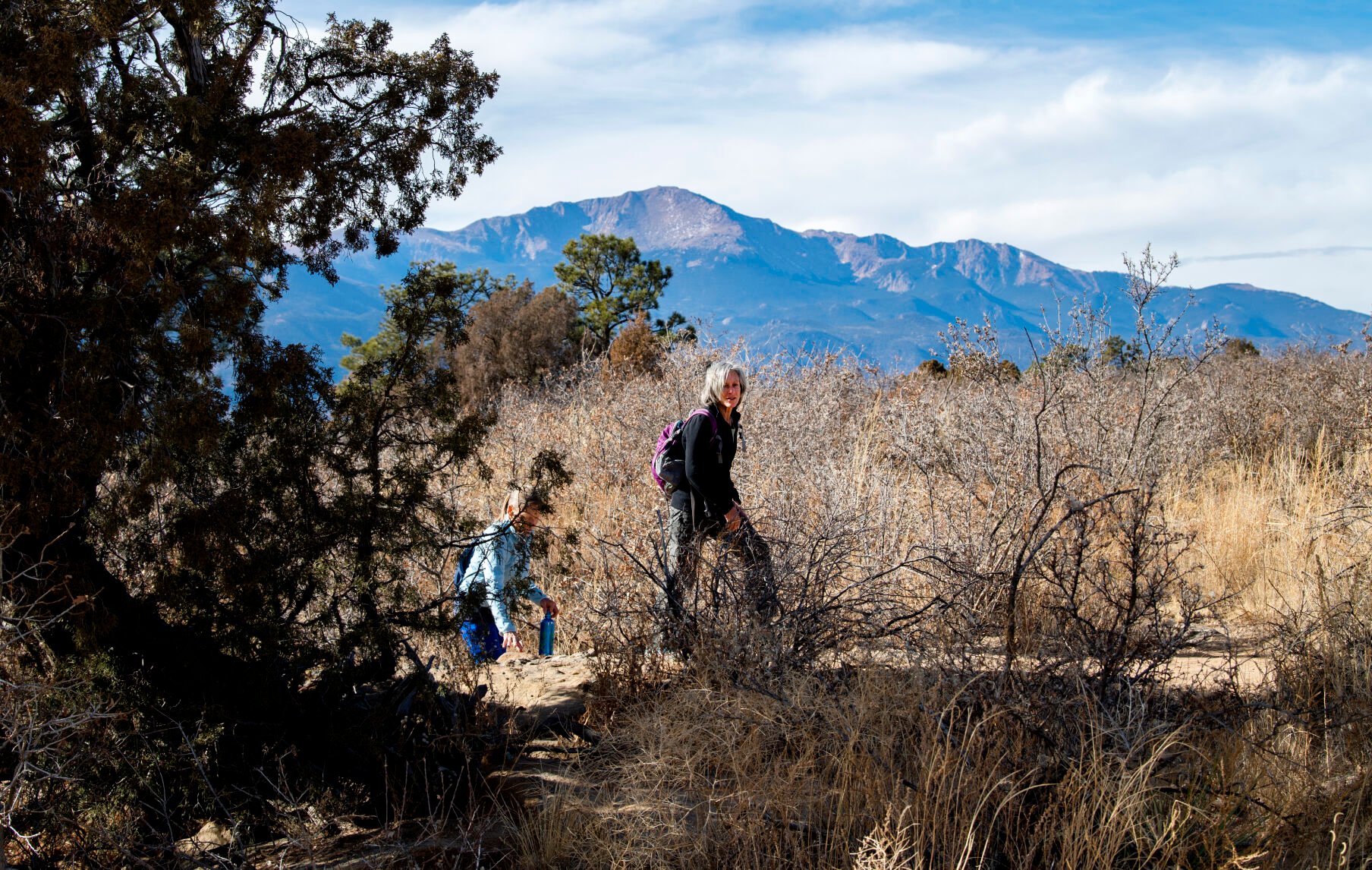 Lynn Bowman, right, and Carmen Franklin hike along the Templeton Trail in Palmer Park in this Gazette file photo. Less metaverse and more