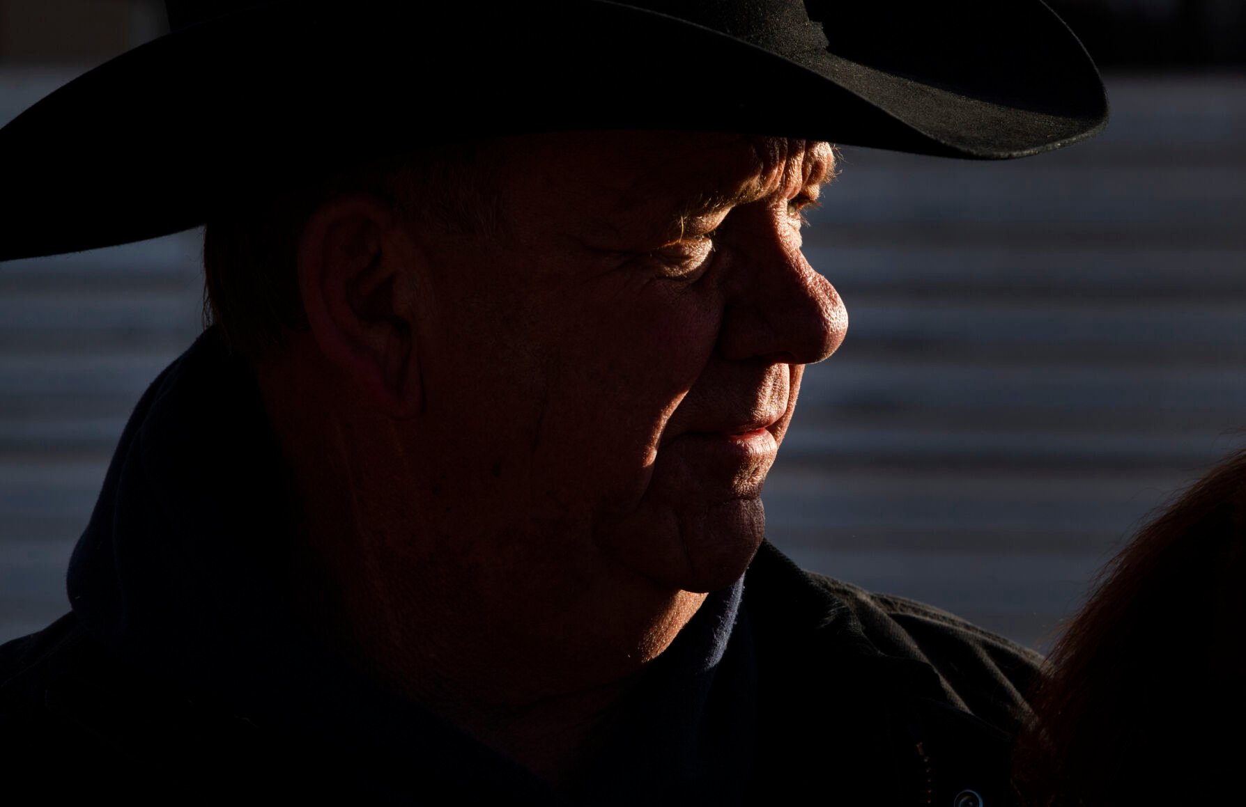 The morning sun spotlights ranch partner Gary Lake at the Silverado Ranch east of Colorado Springs, Wednesday, Jan. 5, 2022. (Christian Murdock, The Gazette)
