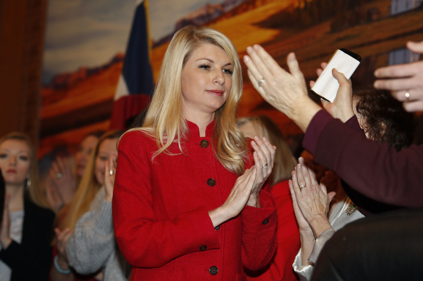 In this file photo, state Sen. Brittany Pettersen, D-Lakewood, applauds at an April 12, 2019, bill-signing ceremony at the state Capitol in Denver for Colorado's 