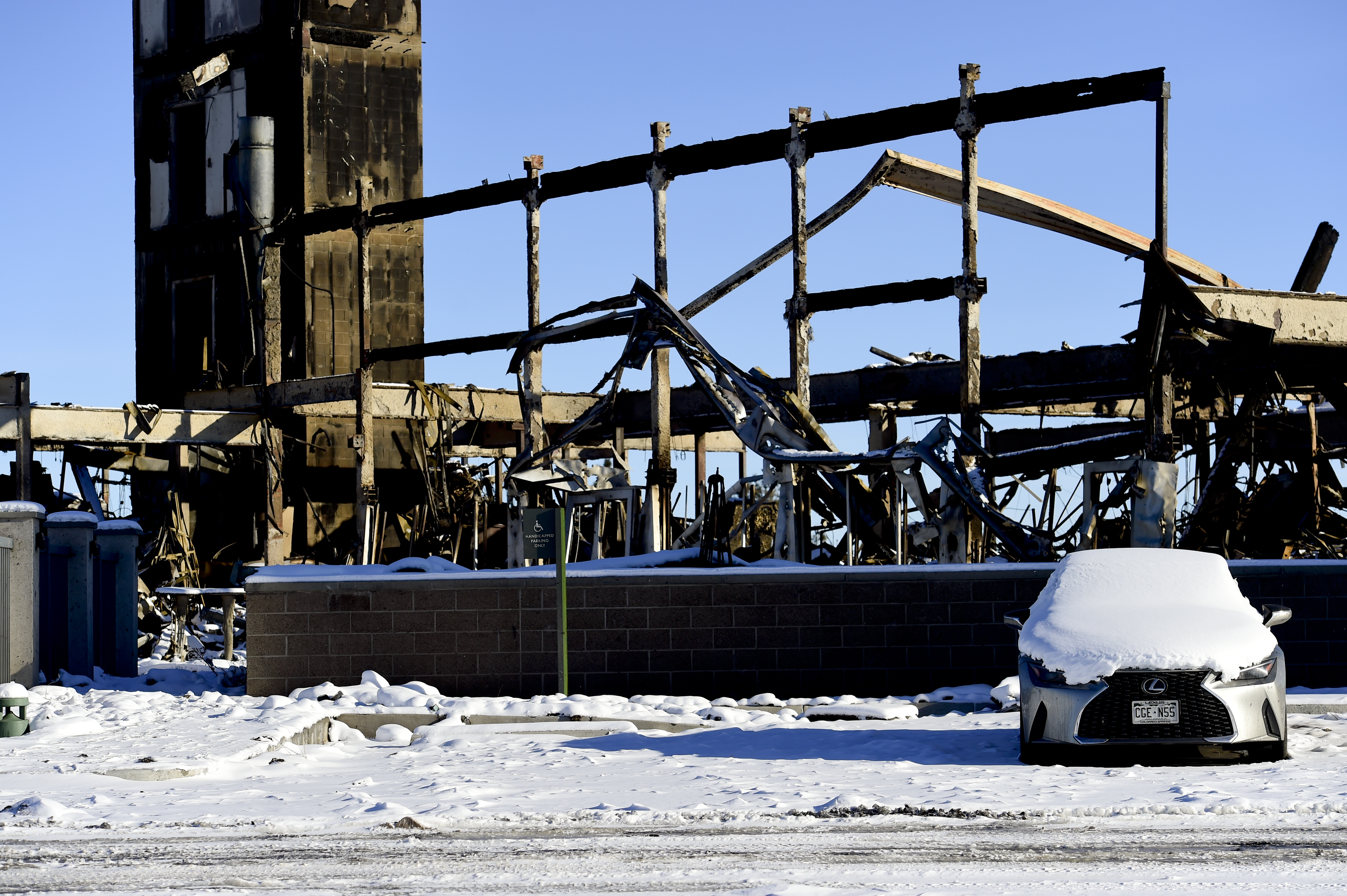 SUPERIOR, CO - JANUARY 2:What remains of the Element Hotel is seen during a tour of the Marshall Fire burn area in Louisville and Superior on Sunday, Jan. 2, 2022. The current estimate of destroyed structures is 991, while 127 structures are damaged according to Boulder County Sheriff Joe Pelle. (Matthew Jonas/Boulder Daily Camera/Pool) (Matthew Jonas)