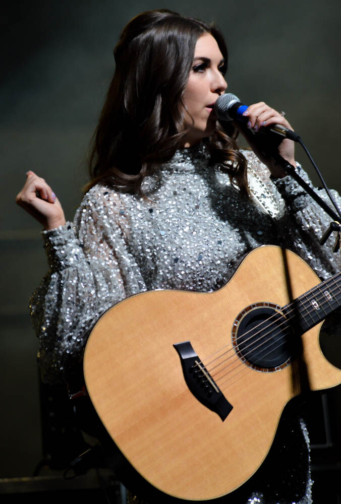 Country western artist and Nashville native Jenny Tolman performs at the grand opening of the H.W. Hutchison Family Stockyards Event Center and the Ron and Cille Williams Yards. (ScottWeiserEnterprise Reporterscott.weiser@gazette.comhttps://secure.gravatar.com/avatar/bedf4ba0a073402c3991ce97ce2869c4?d=mm&r=g)