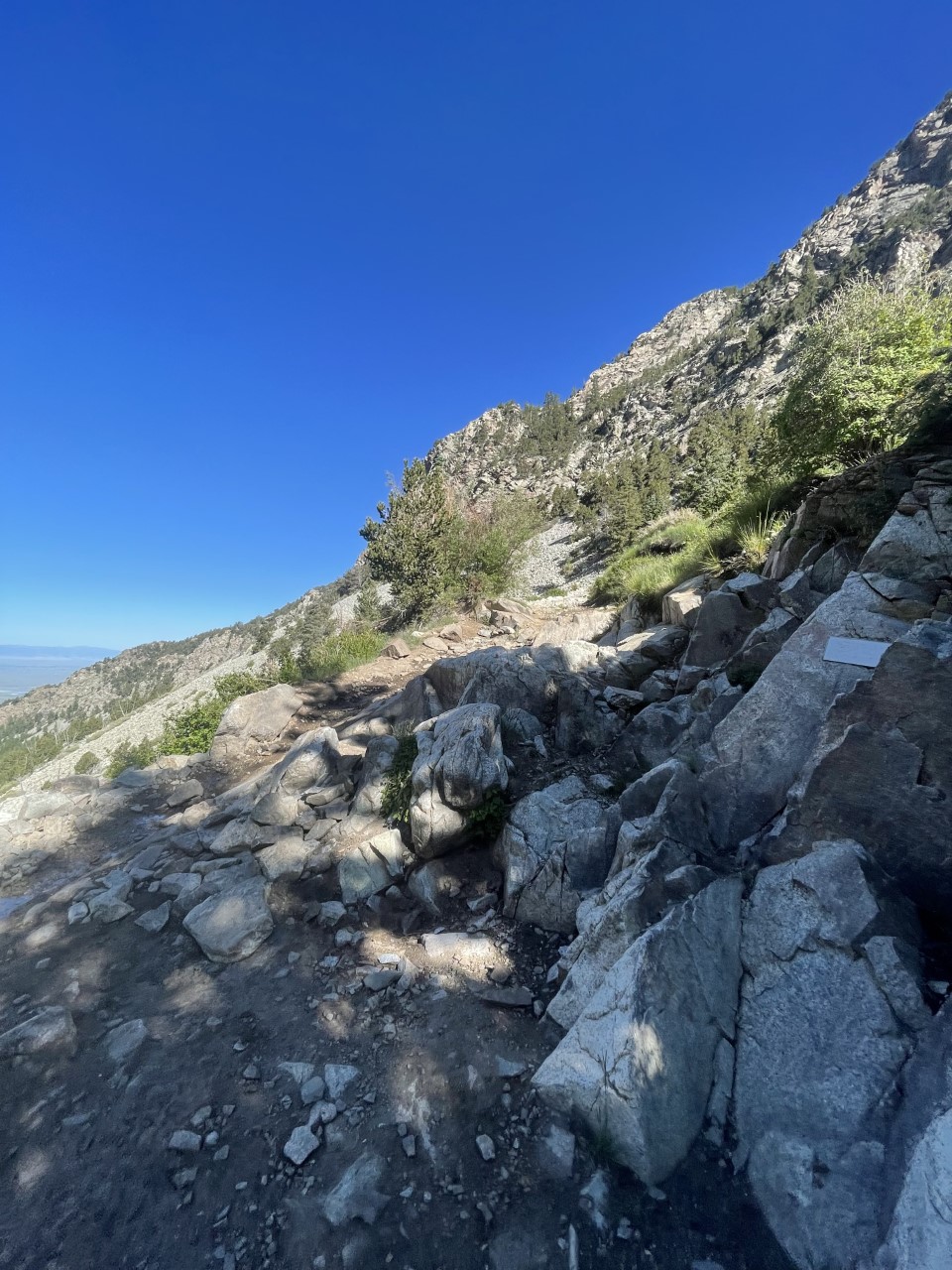 One of the obstacles found along Lake Como road. Note how the road travels over this rocky section, which is much more intimidating in person. A steep slope is found on the left. Photo Credit: Spencer McKee.