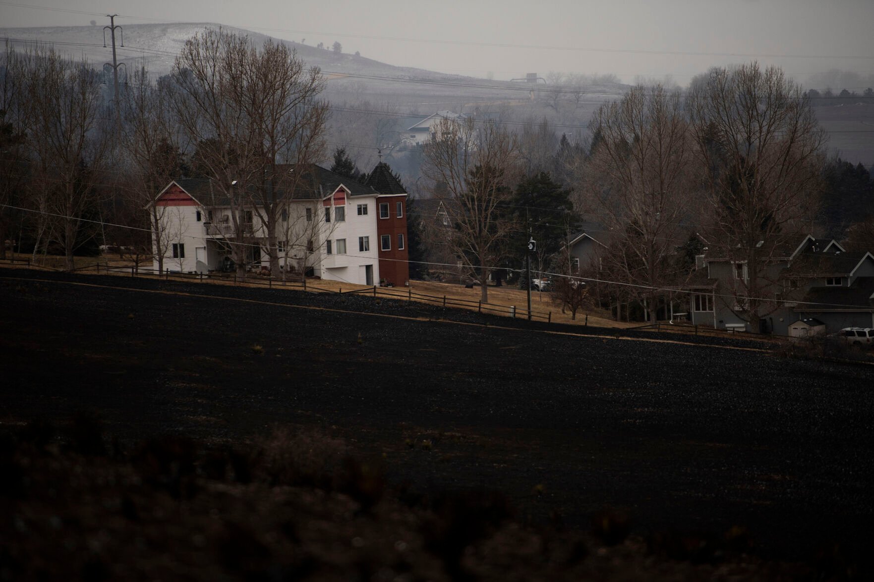 The aftermath of the Marshall fire in Louisville, Colo., on Friday, Dec. 31, 2021. The Marshall fire ripped through Boulder County fulled by high-winds on Thursday, destroying over 500 homes. The number of destroyed homes will likely increase as approximately 35,000 people were evacuated in Louisville and Superior.(Chancey Bush/ The Gazette) (Chancey Bush/ The Gazette)