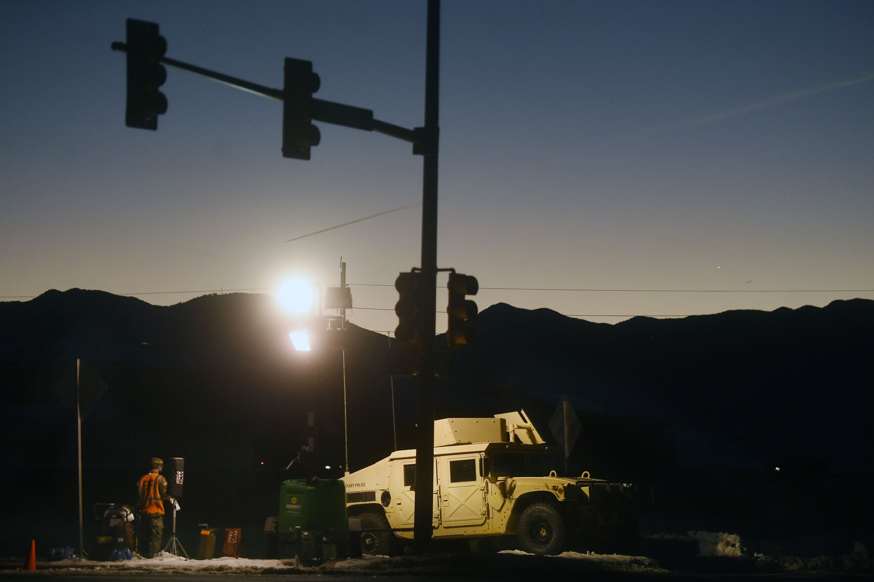 Last week, Gov. Polis called in the National Guard to help with policing the Marshall Fire area. One group of guardsmen guard one of the intersection north of the fire zone on S. Boulder Rd. On Sunday, Jan. 2, 2021. (Photo by Jerilee Bennett, The Gazette)
