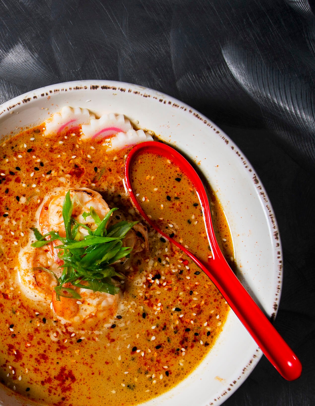 White soy and rice wine marinated BBQ shrimp with miso broth and sweet and sour tare and fish cake at Rooster’s House of Ramen in Colorado Springs. (Photos by Christian Murdock, The Gazette)