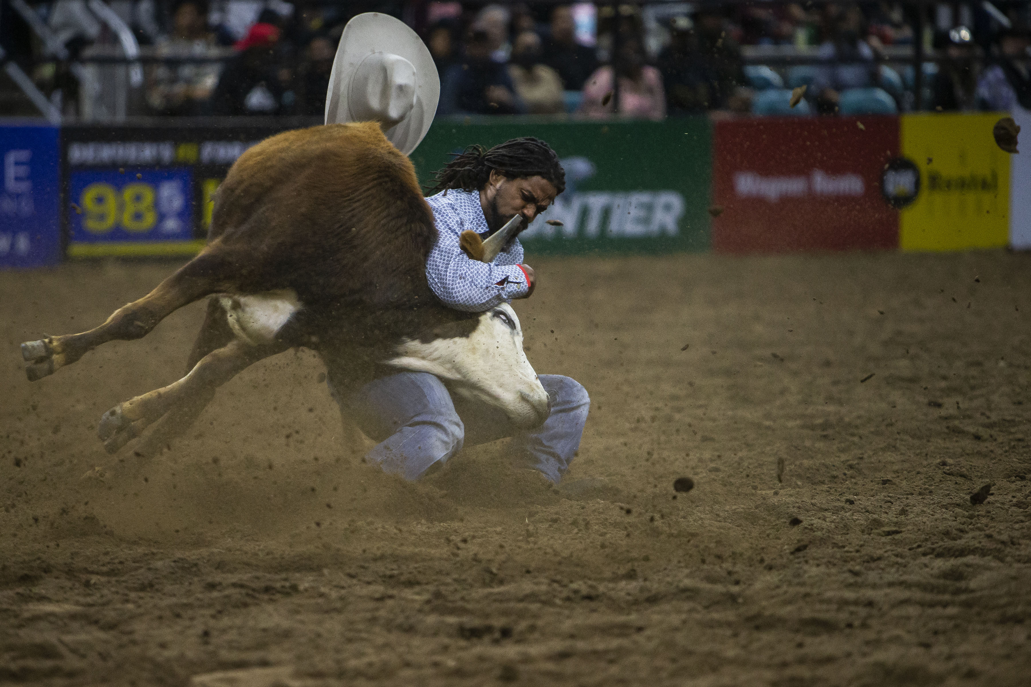 Denard Hunt from Oklahoma City wrestles a steer to the ground during the African-American Heritage Rodeo at the National Western Stock Show on Monday, Jan. 17, 2022, in Denver, Colo. (Timothy Hurst/The Gazette) (Timothy Hurst)
