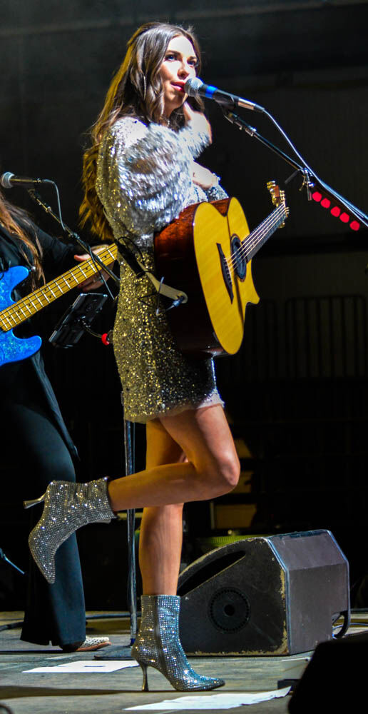 Country western artist and Nashville native Jenny Tolman performs at the grand opening of the H.W. Hutchison Family Stockyards Event Center and the Ron and Cille Williams Yards. (ScottWeiserEnterprise Reporterscott.weiser@gazette.comhttps://secure.gravatar.com/avatar/bedf4ba0a073402c3991ce97ce2869c4?d=mm&r=g)