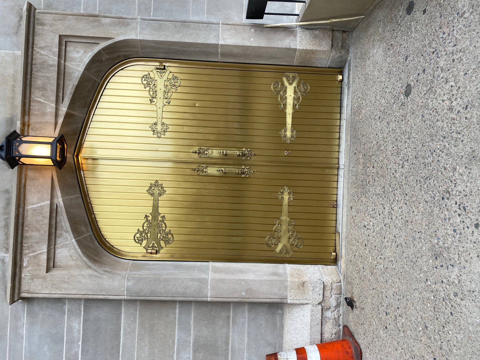 The bronze front doors of Denver's downtown Basilica were cleaned at a cost of $10,000. People from all over the country sent in money when they read about the graffiti incident. (Carol McKinley)