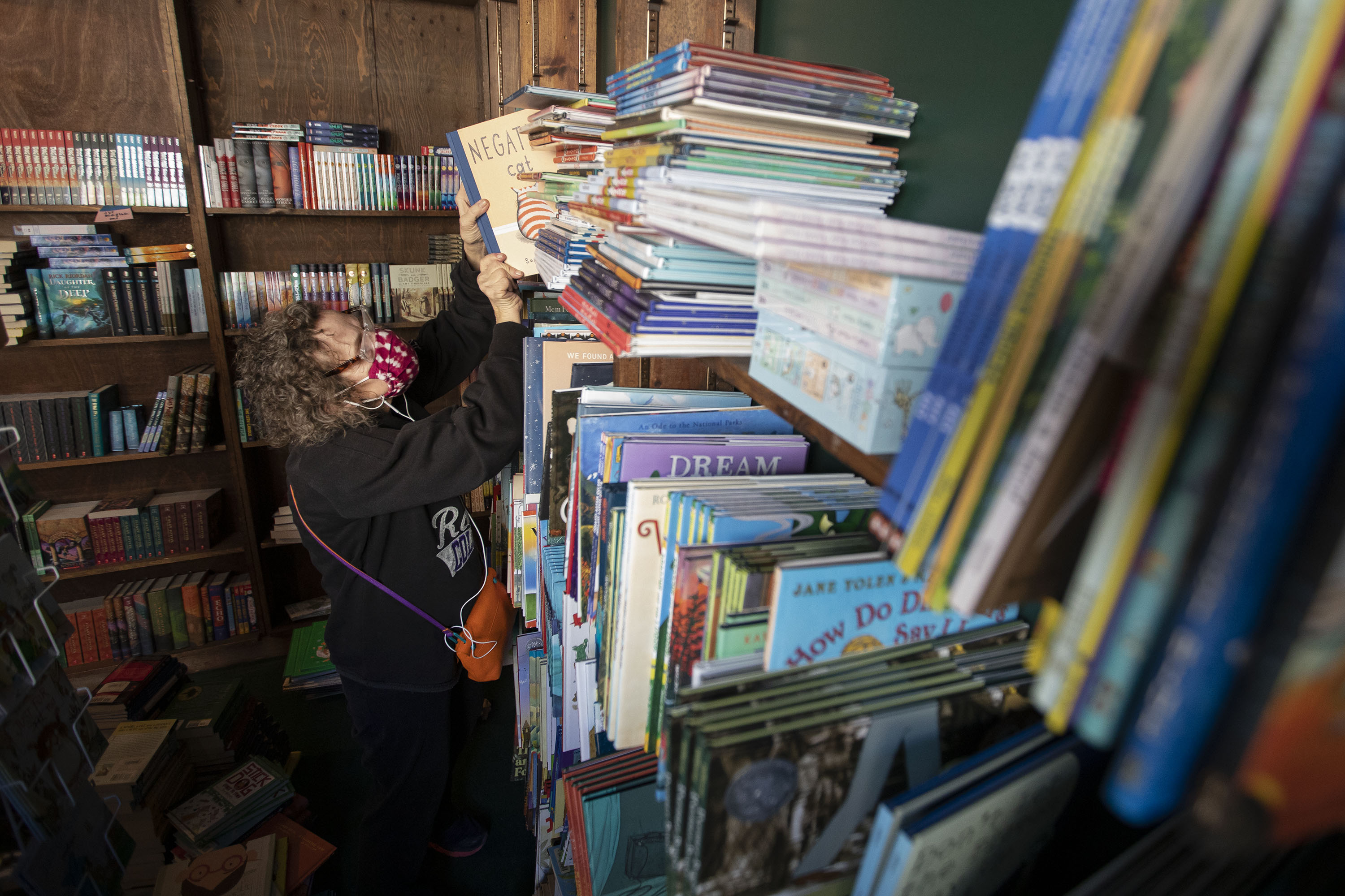 Tattered Cover Book Store children’s book buyer Kate Brasch stocks the shelves in the children’s section Tuesday in preparation of the store opening its newest location in Westminster. (TimHursttim.hurst@gazette.comhttps://secure.gravatar.com/avatar/aca82bd62b4ee425c598527cd6faa1b1?d=mm&r=g)
