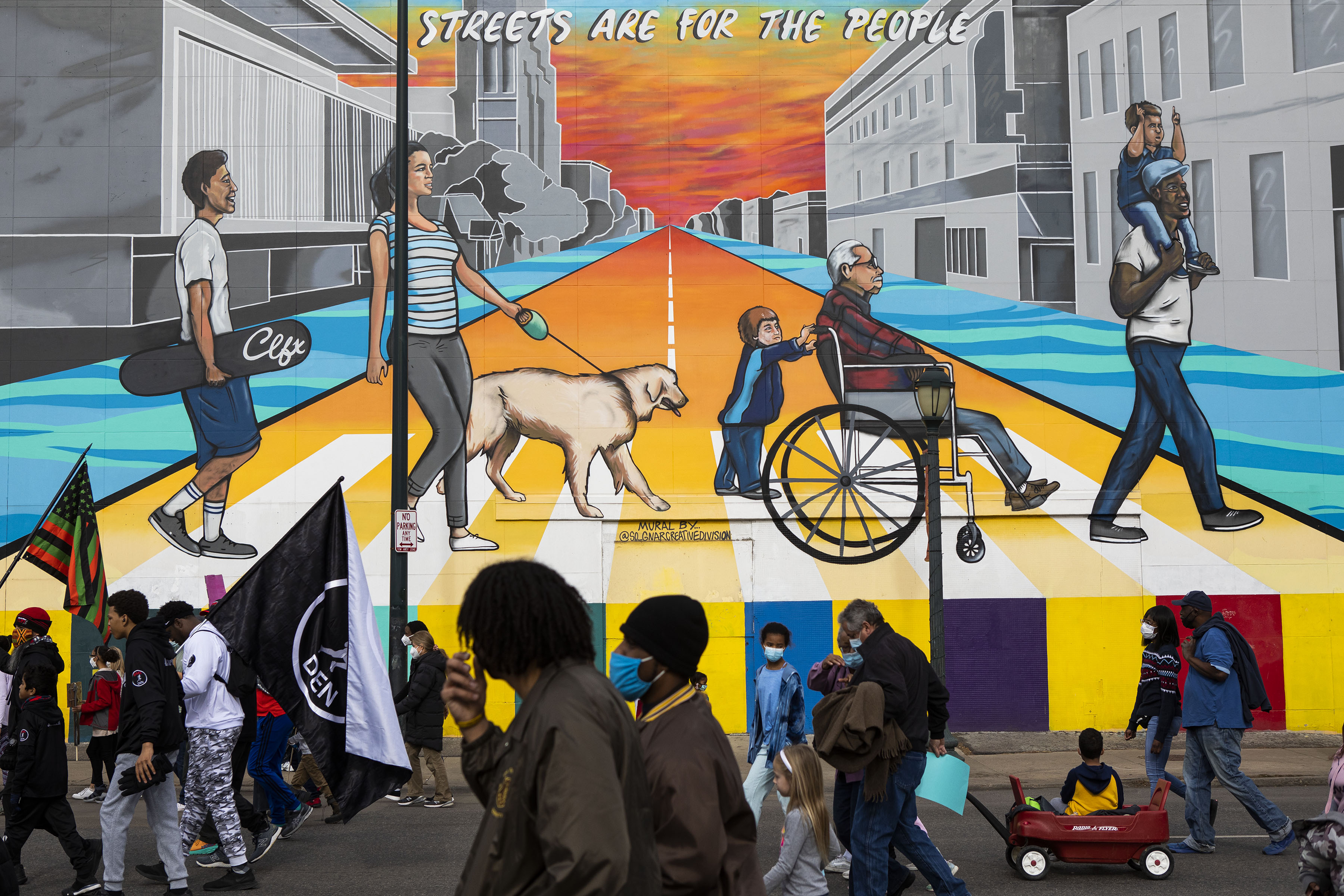The Martin Luther King Marade marches down East Colfax Avenue on Monday, Jan. 17, 2022, in Denver, Colo. (Timothy Hurst/The Gazette) (Timothy Hurst)