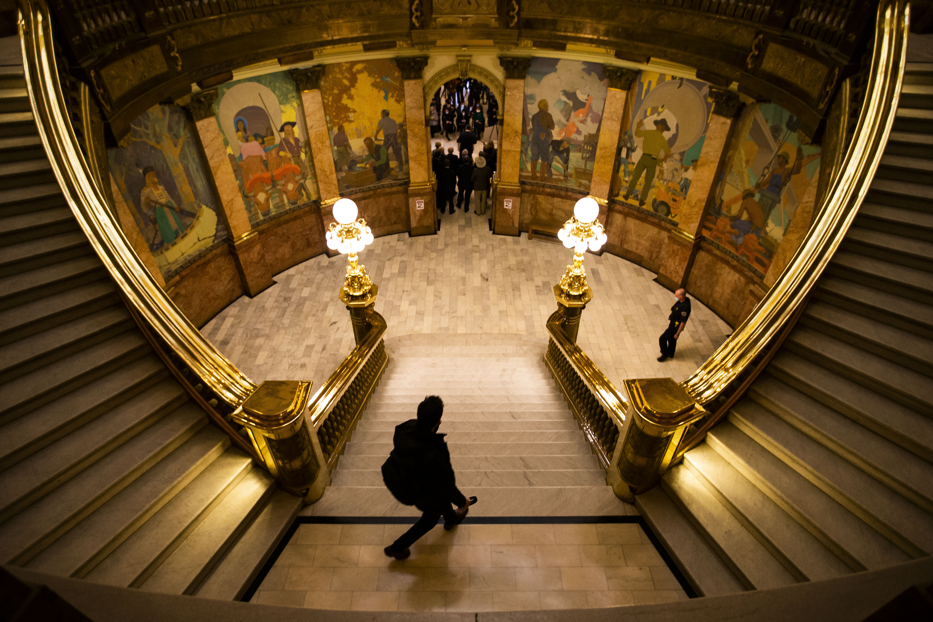 A man walks down the central staircase while Republicans give a press conference during the first day of Colorado’s 2022 session at the Colorado State Capitol building on Wednesday, Jan. 12, 2022, in Denver, Colo. (Timothy Hurst/The Gazette) (Timothy Hurst)