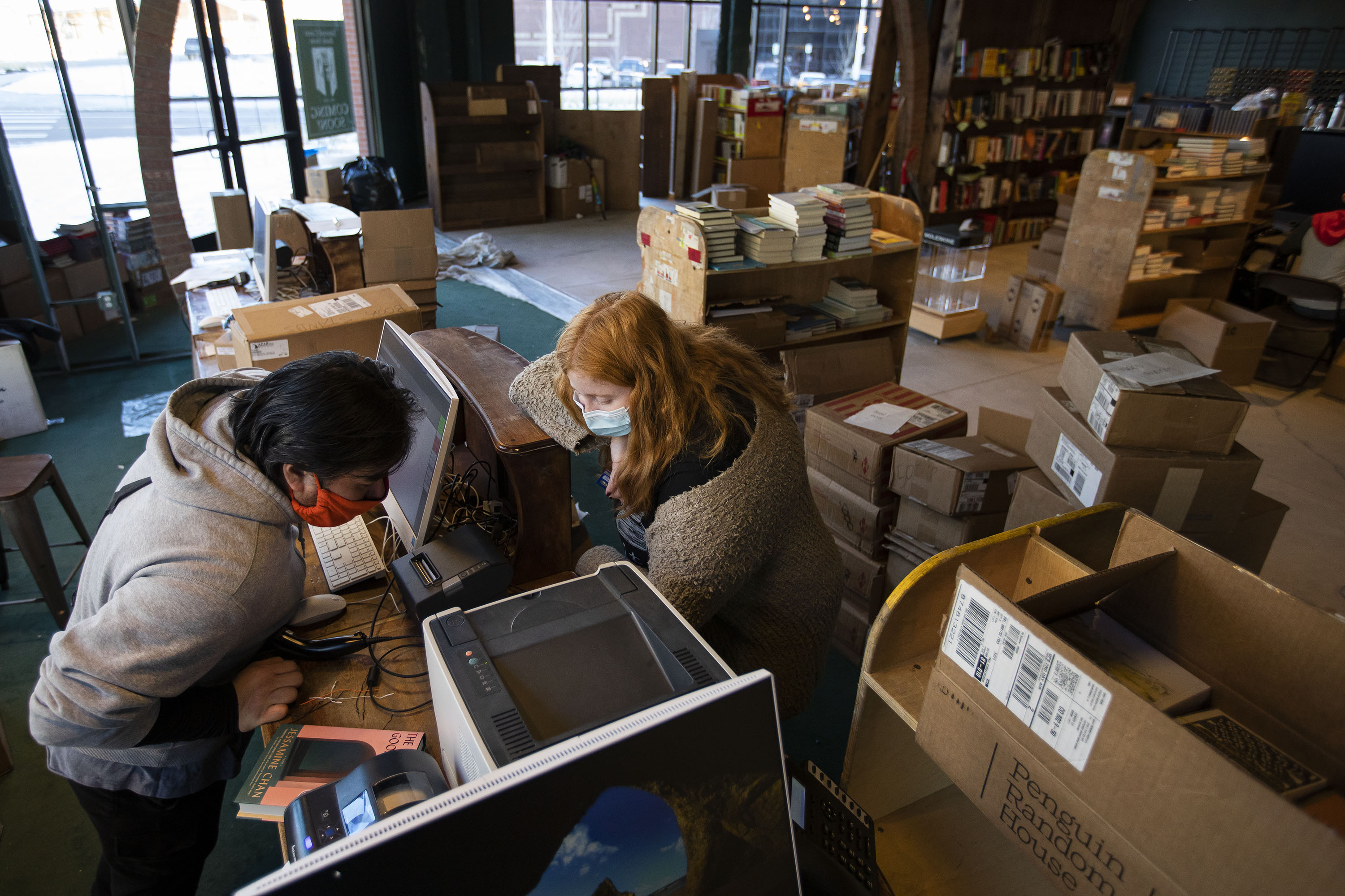 Tattered Cover Book Store director of technology Mike Pham, left, checks out book seller Caroline Frenzel’s copy of “The School for Good Mothers: A Novel by Jessamine Chan” while troubleshooting the credit card machines Tuesday in preparation of the store opening its newest location in Westminster. Frenzel’s purchase is the first official purchase from this Tattered Cover location. (DennisHuspeniCity Editordennis.huspeni@gazette.comhttps://denvergazette.com/content/tncms/avatars/c/5a/fbd/c5afbd32-5030-11eb-bdef-030d9de52a9e.779683cee495ffe64766291c251a8894.png)