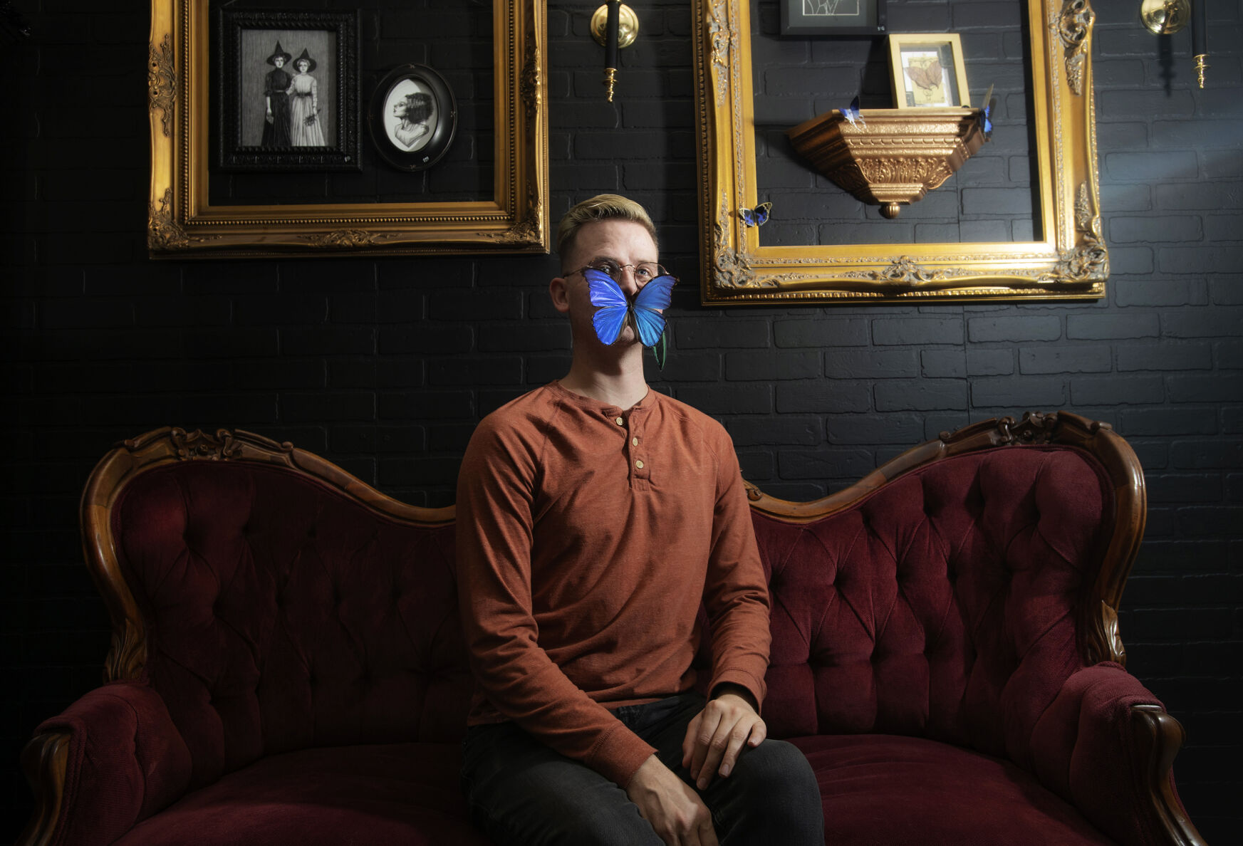 Andrew Cronk, co-owner of Cronk Art & Curiosities, poses with a giant blue morpho butterfly at his new store in Colorado Springs in December. Cronk’s passion for insects and art has led him to specialize in ethically sourced arthropod taxidermy while spreading the message about the importance of pollinators. (photos by Chancey Bush, The Gazette)