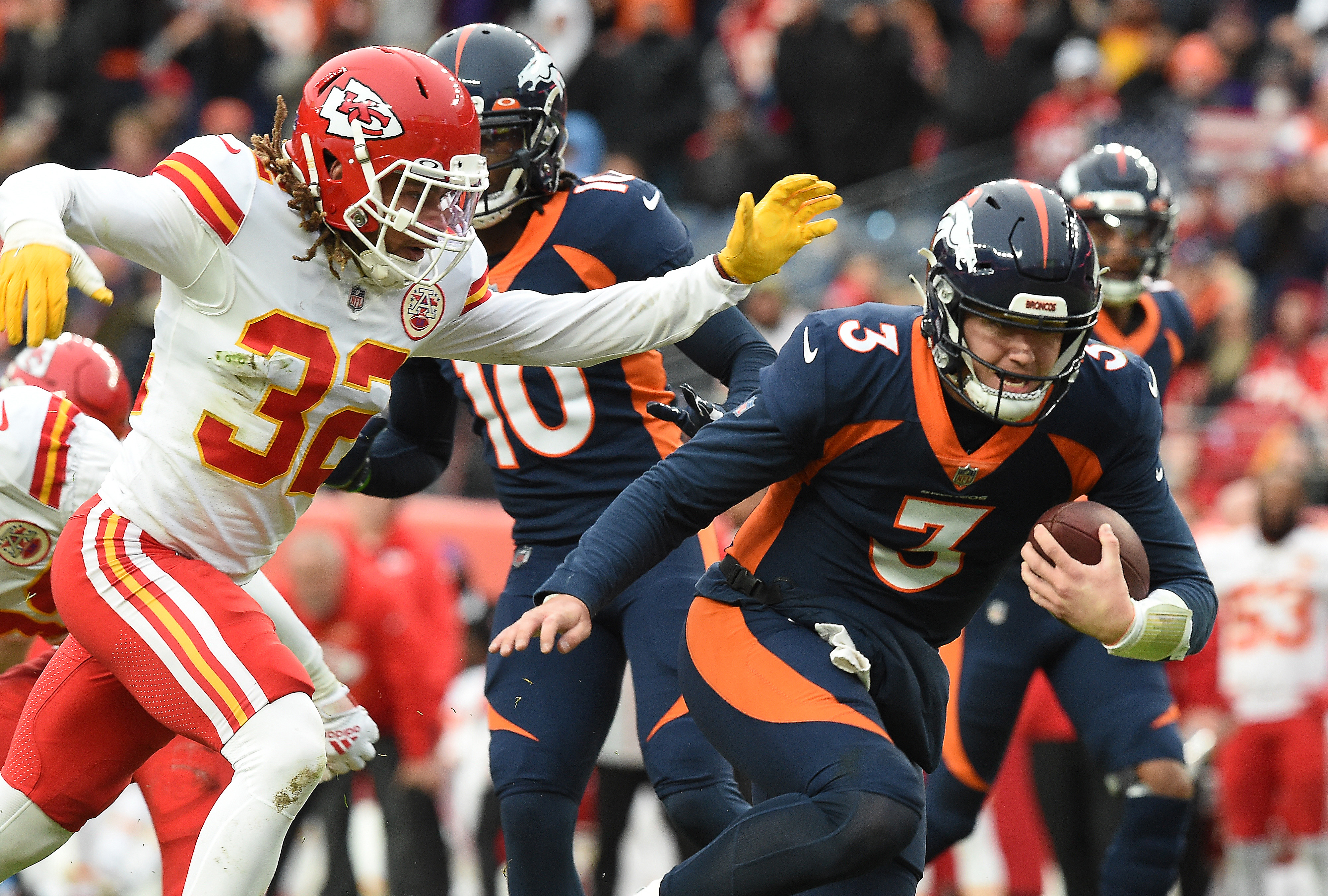 Broncos quarterback Drew Lock puts it in gear and heads for his second rushing touchdown of the game against the Chiefs on Saturday, Jan. 8, 2022 at Empower Field at Mile High. (Photo by Jerilee Bennett, The Gazette) (Jerilee Bennett)