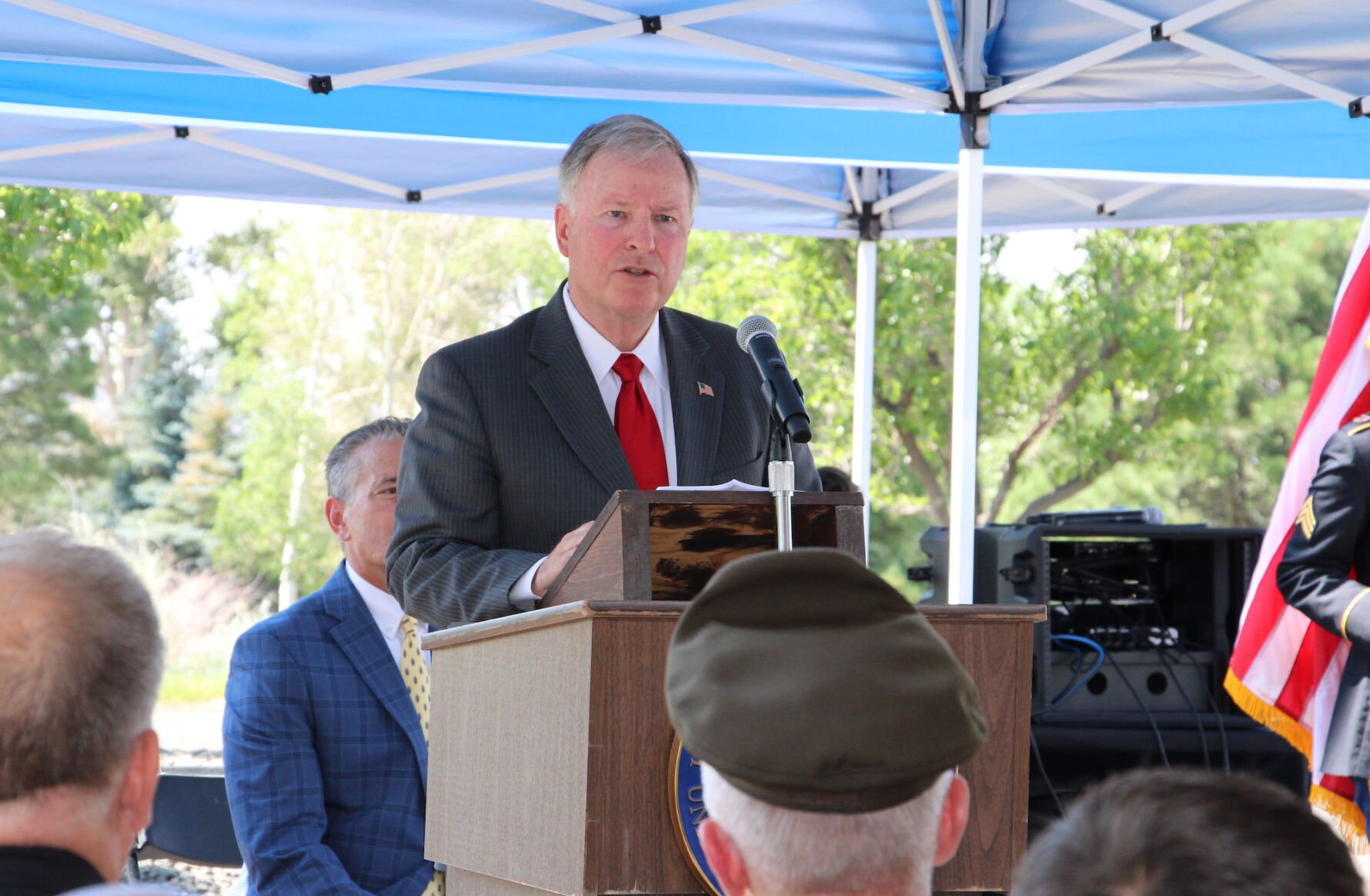 In this file photo, U.S. Rep. Doug Lamborn, center, a Colorado Springs Republican, speaks at a ceremony naming the Briargate Post Office after fallen Army chaplain Captain Dale Goetz, who was killed in action in Afghanistan in 2010, on July 23, 2021, in Colorado Springs. ((Courtesy photo))