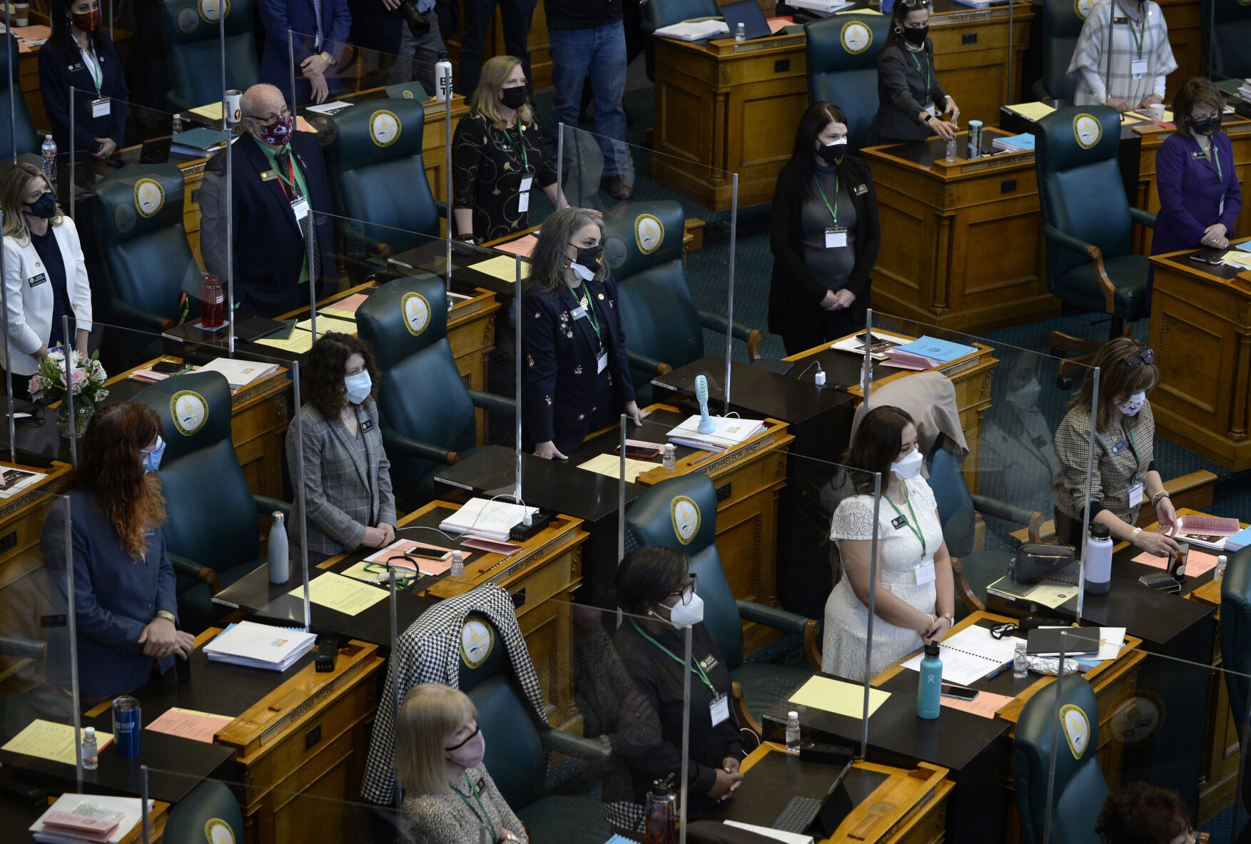 DENVER, CO - JANUARY 13: Representatives are asked to stand on the floor of the House during the first legislative day of the 73rd General Assembly at the Colorado State Capitol on January 13, 2021 in Denver, Colorado. ((Photo By Kathryn Scott))