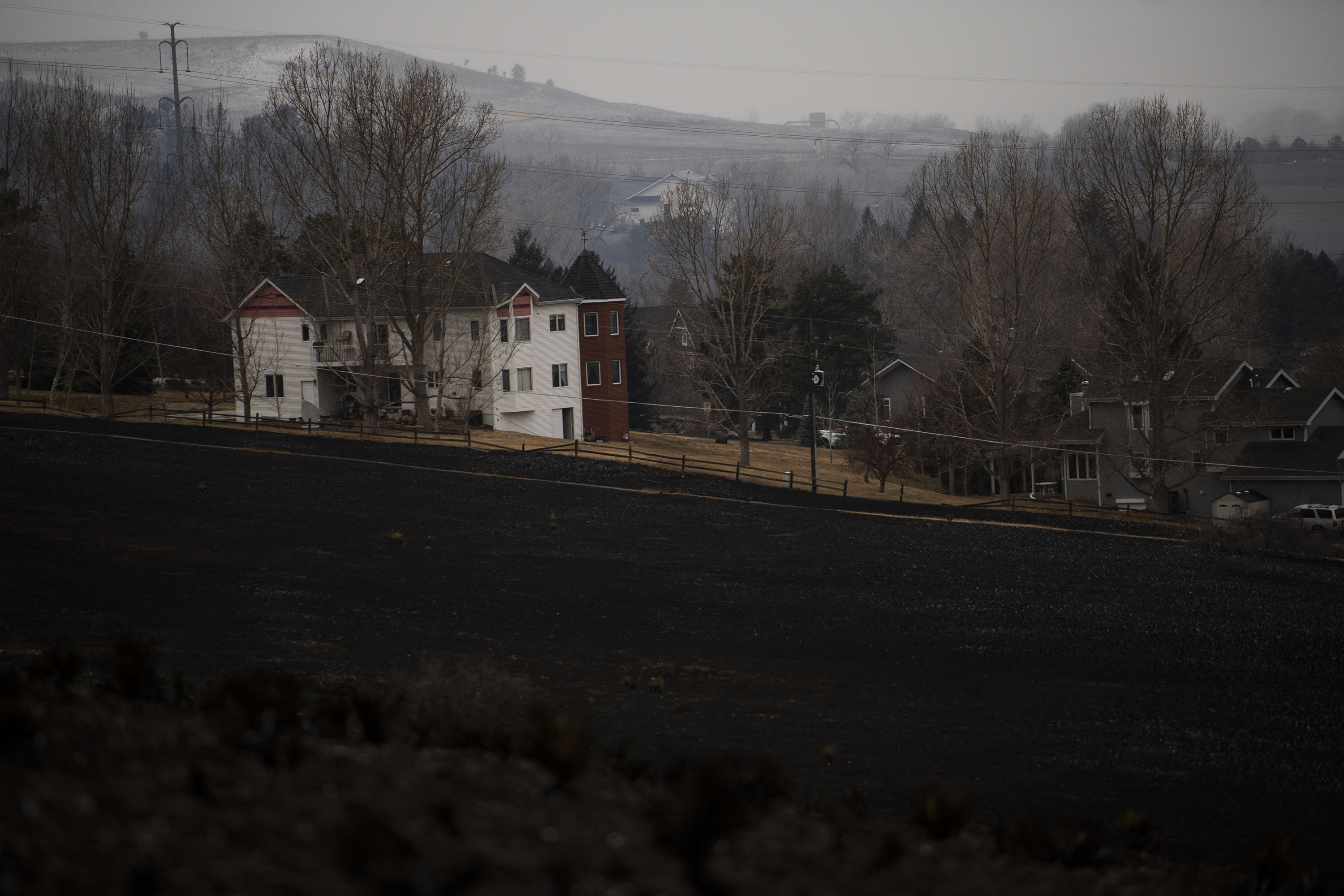 The aftermath of the Marshall fire in Louisville, Colo., on Friday, Dec. 31, 2021. The Marshall fire ripped through Boulder County fulled by high-winds on Thursday, destroying over 500 homes. The number of destroyed homes will likely increase as approximately 35,000 people were evacuated in Louisville and Superior.(Chancey Bush/ The Gazette) (Chancey Bush/ The Gazette)