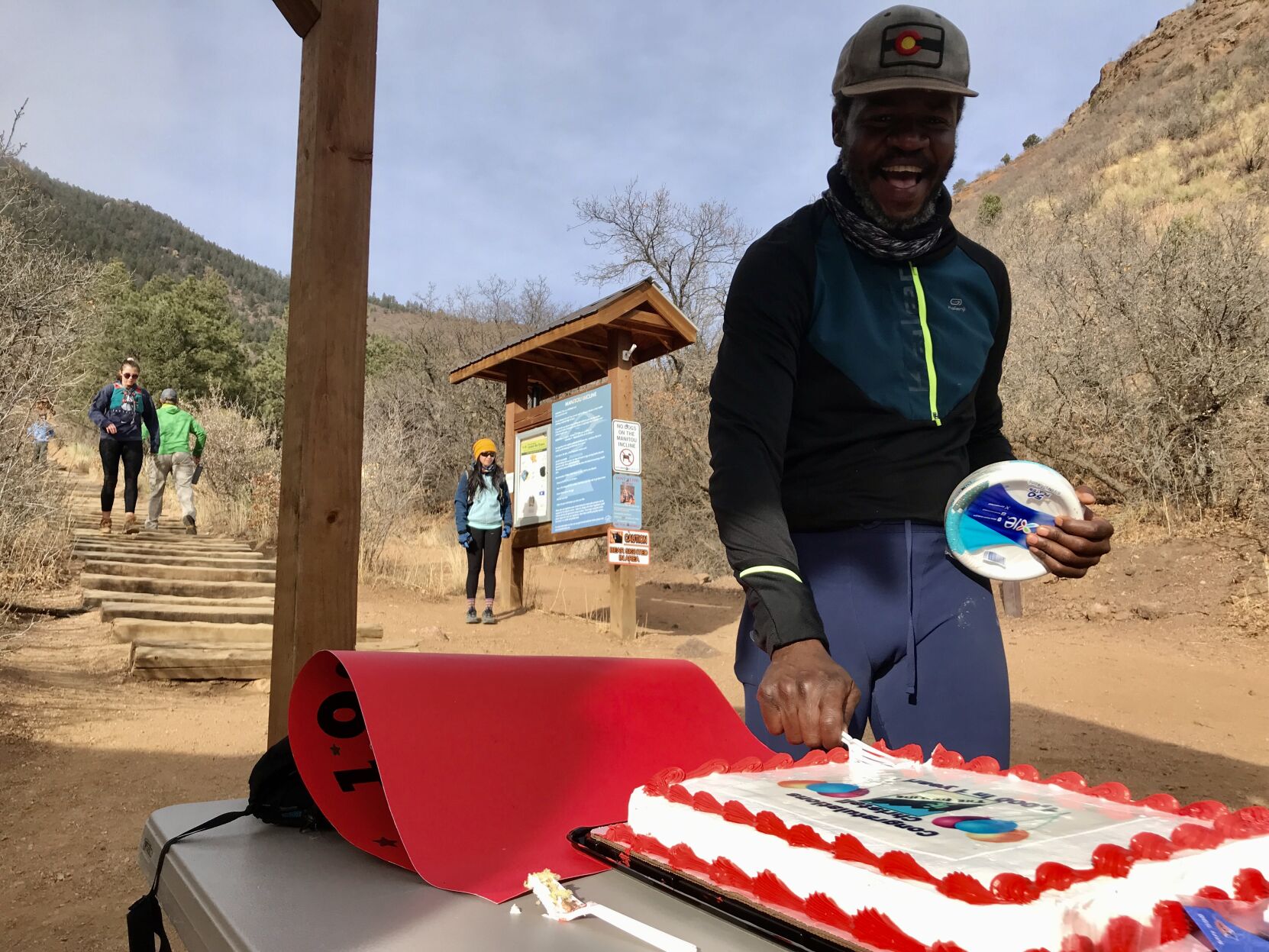 Christel Aime celebrates 1,001 Incline climbs in a year with cake at the base. Photo by Seth Boster, The Gazette (Seth Boster, The Gazette)